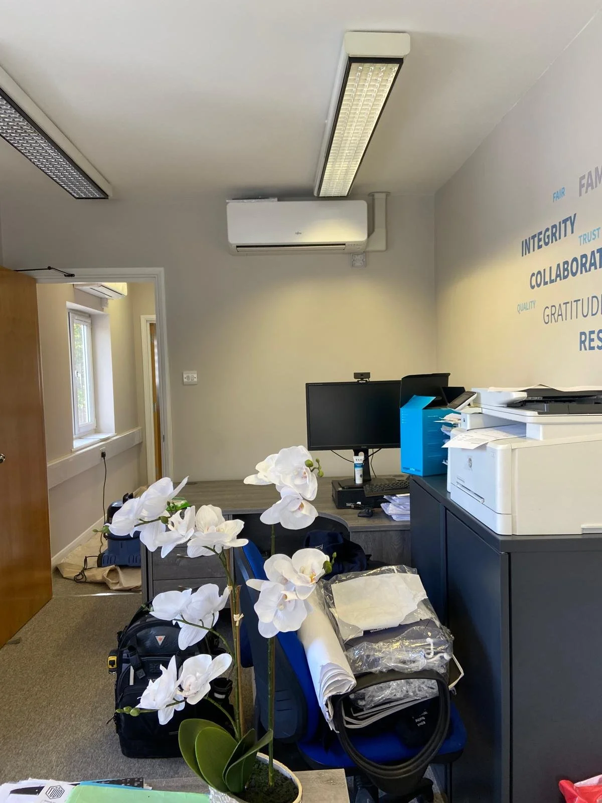 A wall mounted air conditioning system in an office