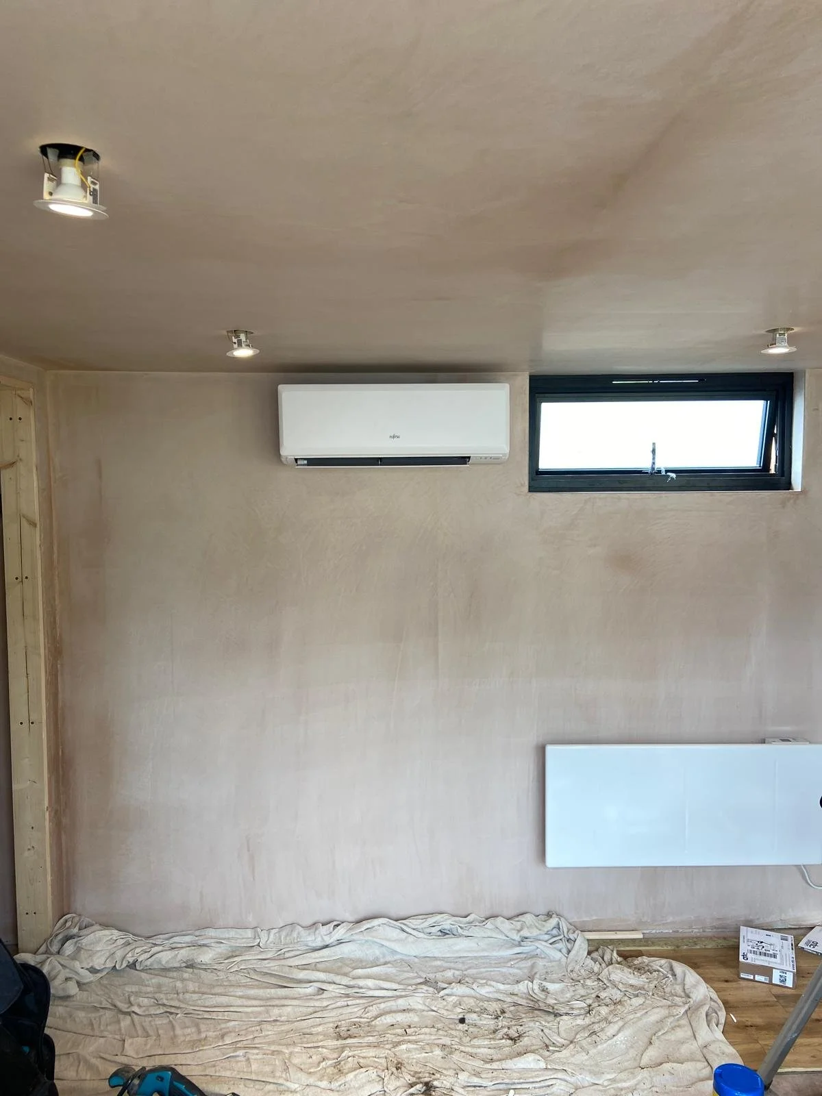 A new room with wall mounted split AC system