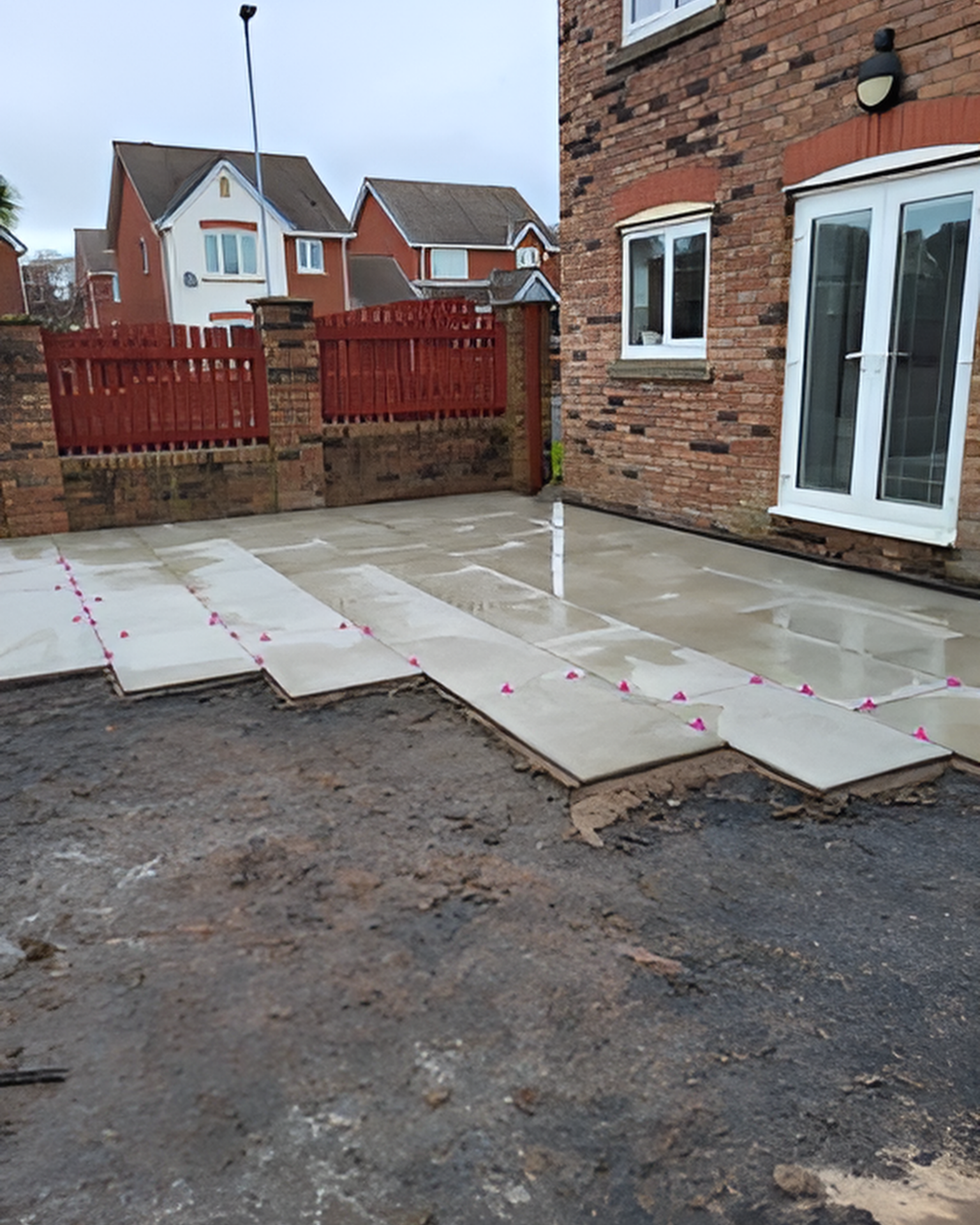 Above is an example of Triple TTT  laying down a patio in a customer's back garden.