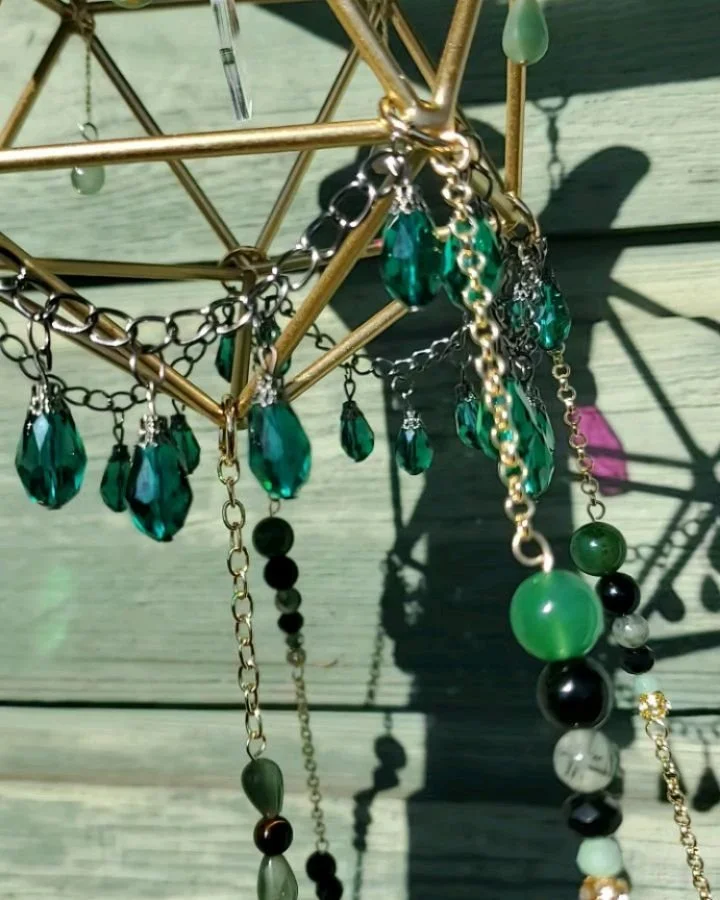 Introducing: Love story
Shes carefully crafted with Tigers eye, Prehnite, died Agate, Aventurine, and an assortment of glass beads. At 25” long and 5” wide, this will add the perfect sun sparkle to any home. Ready to cast light into your