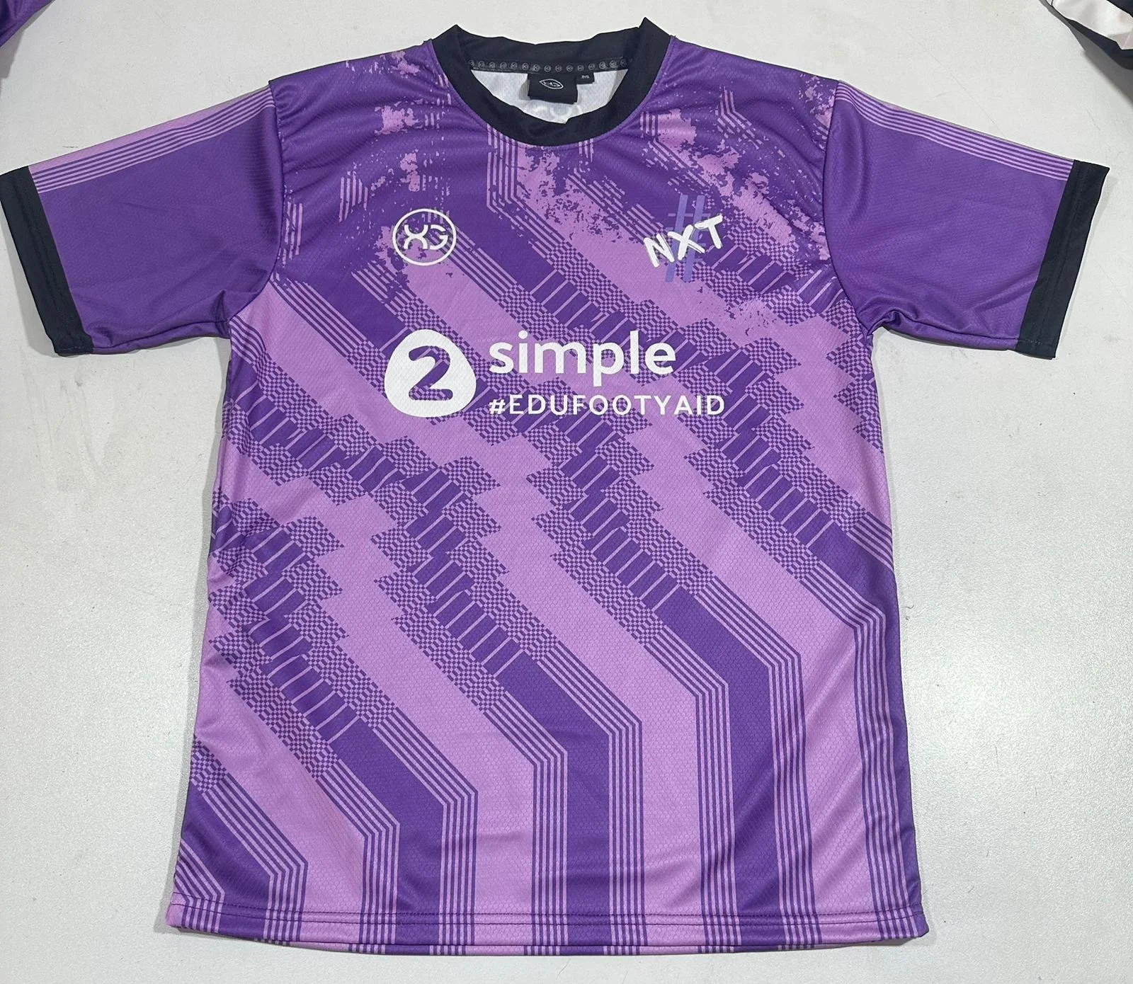 EDU FOOTY AID SHIRT.jpeg