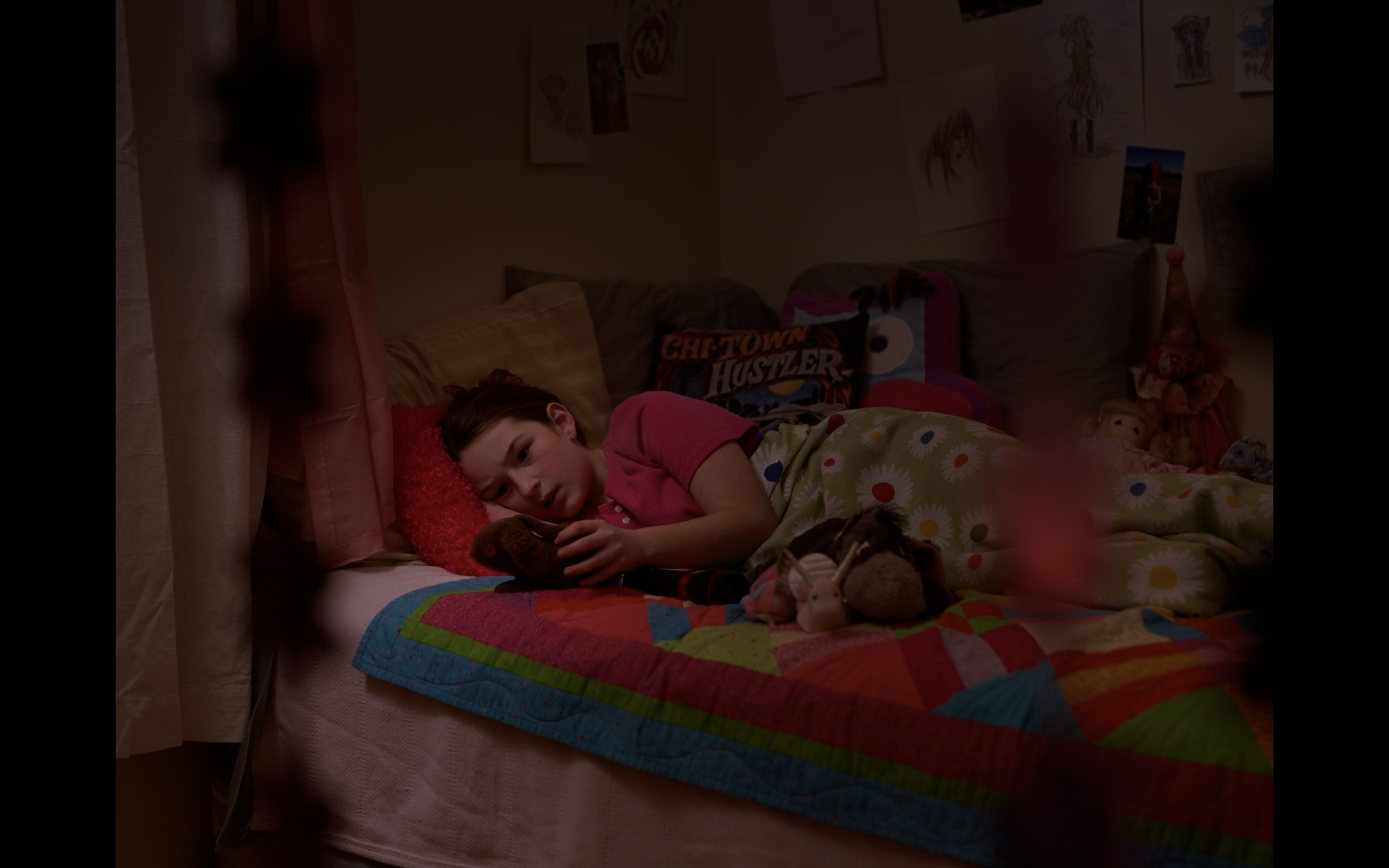 YOUNGER DAISY slowly reaches for a flashlight from her bedside table and turns it on.