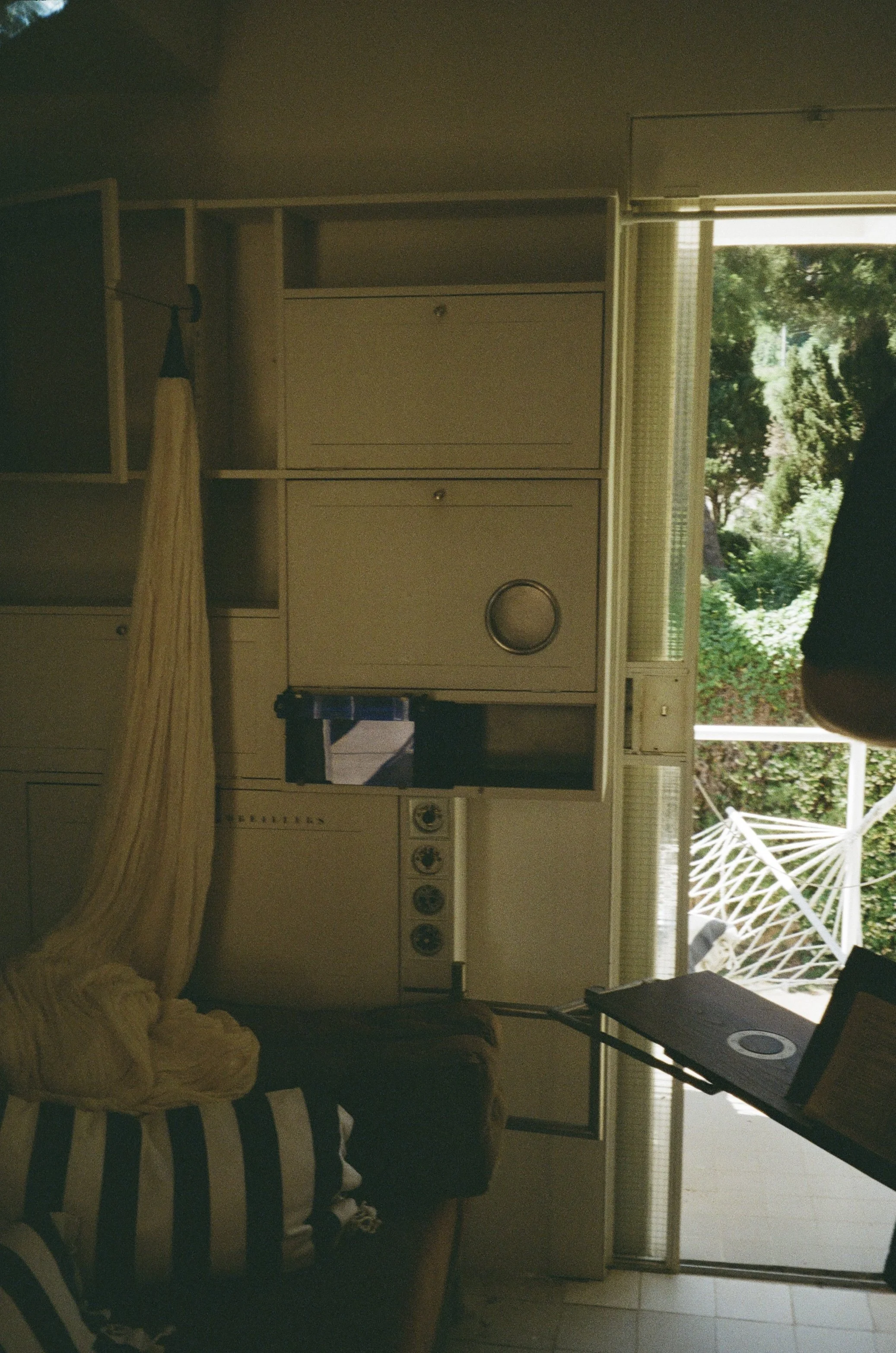 Daybed reading nook. 2025. 35mm color film.