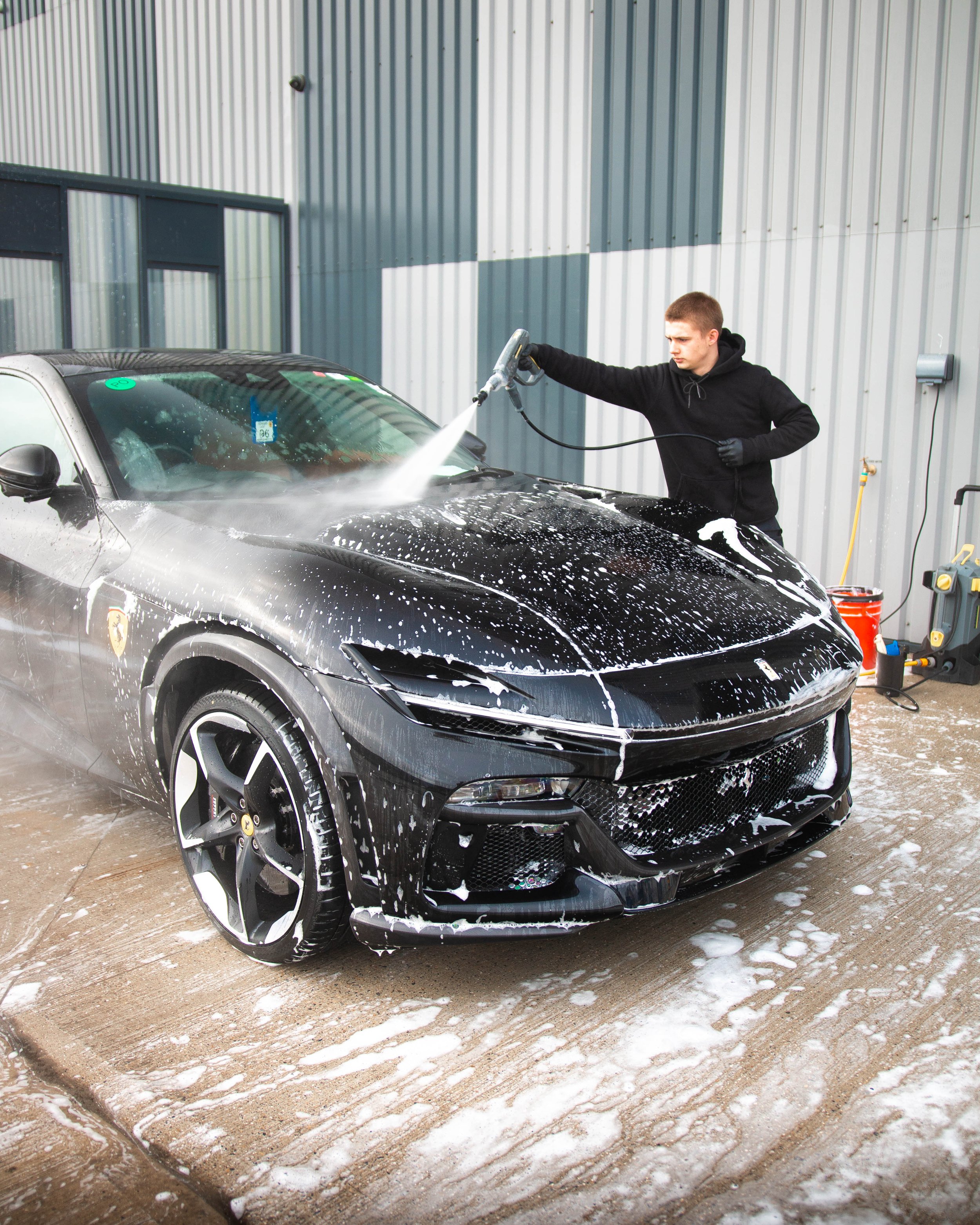 Ferrari getting washed before ppf installation.jpg