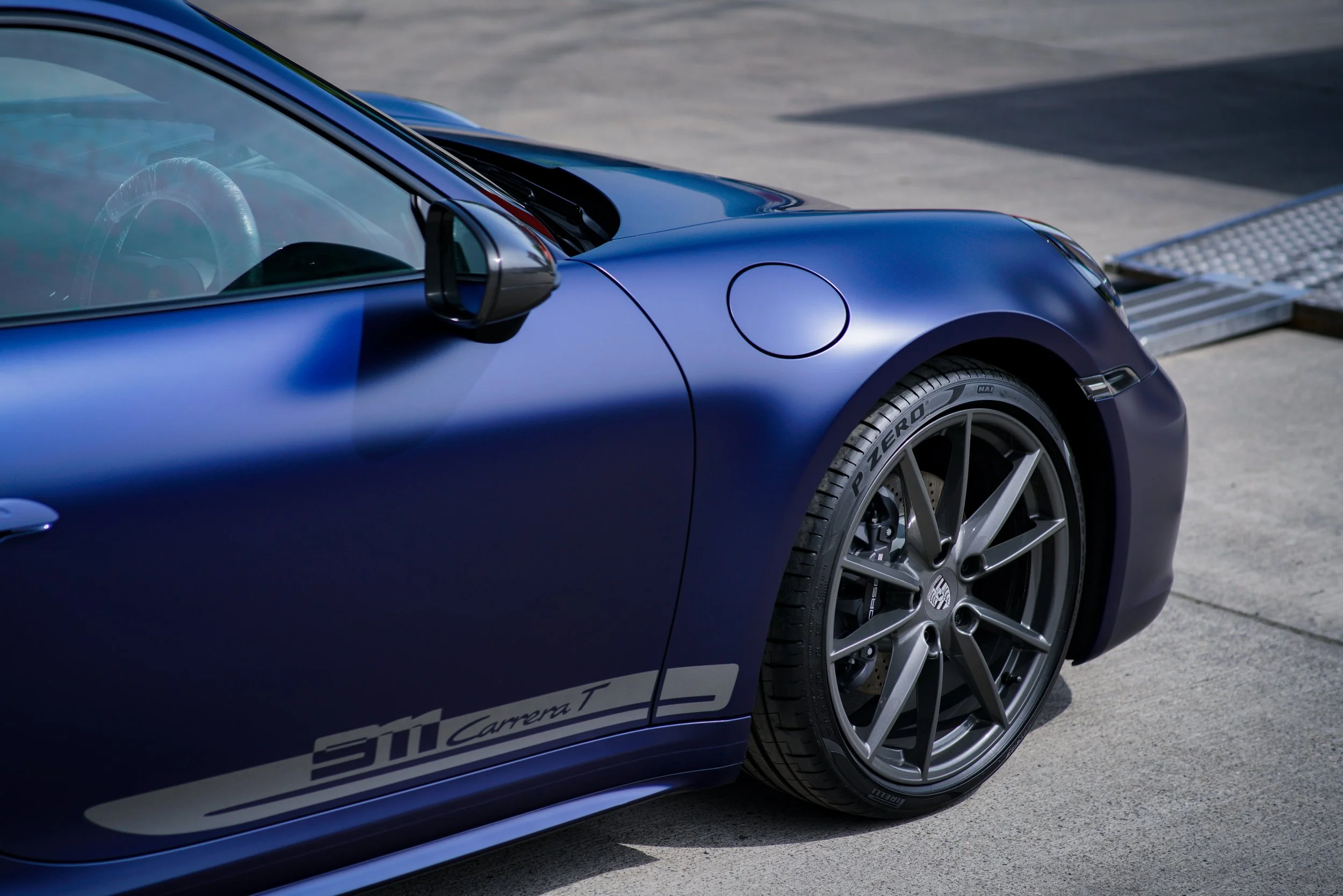 Front angle of Porsche 911 Carrera T after full matte PPF installation and custom colour-matched gloss livery by Lucid PPF Leeds