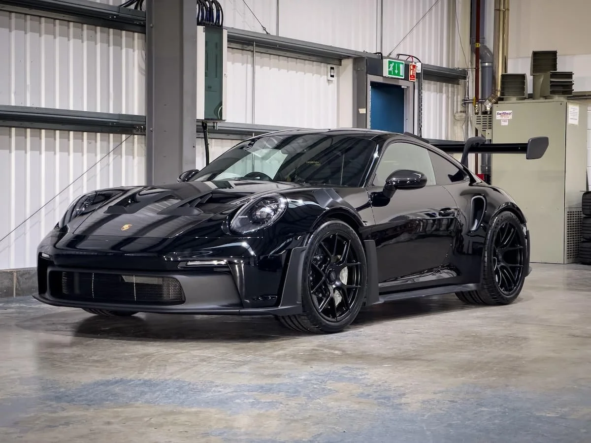 Black Porsche 911 GT3 RS in Lucid PPF Leeds workshop before paint protection film and livery installation