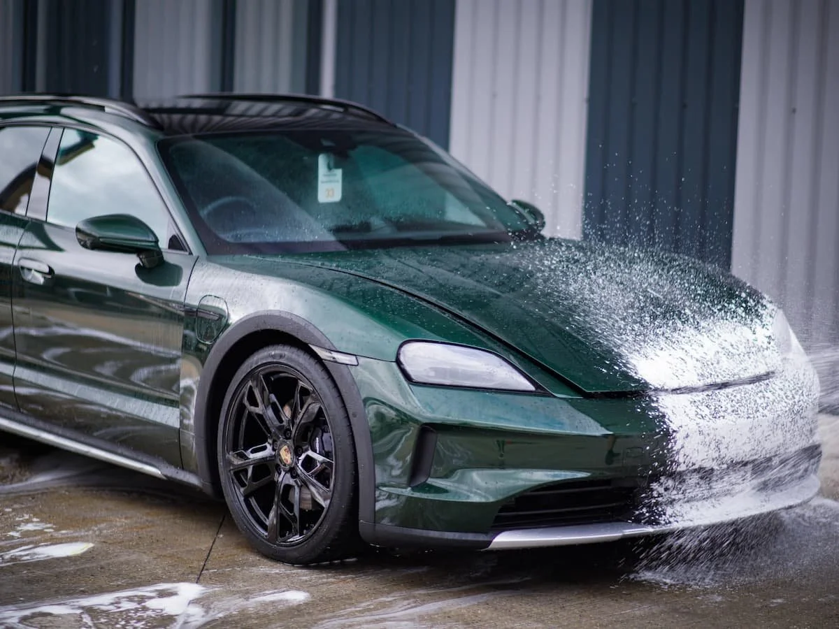 Porsche Taycan Cross Turismo being washed before satin matte paint protection film installation at Lucid PPF Leeds