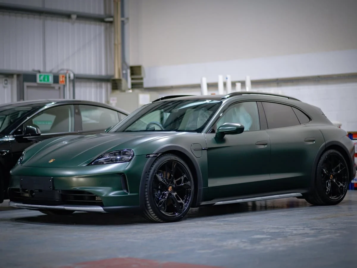 2024 Porsche Taycan Cross Turismo in PTS Oak Green Metallic NEO with full satin matte paint protection film by Lucid PPF Leeds