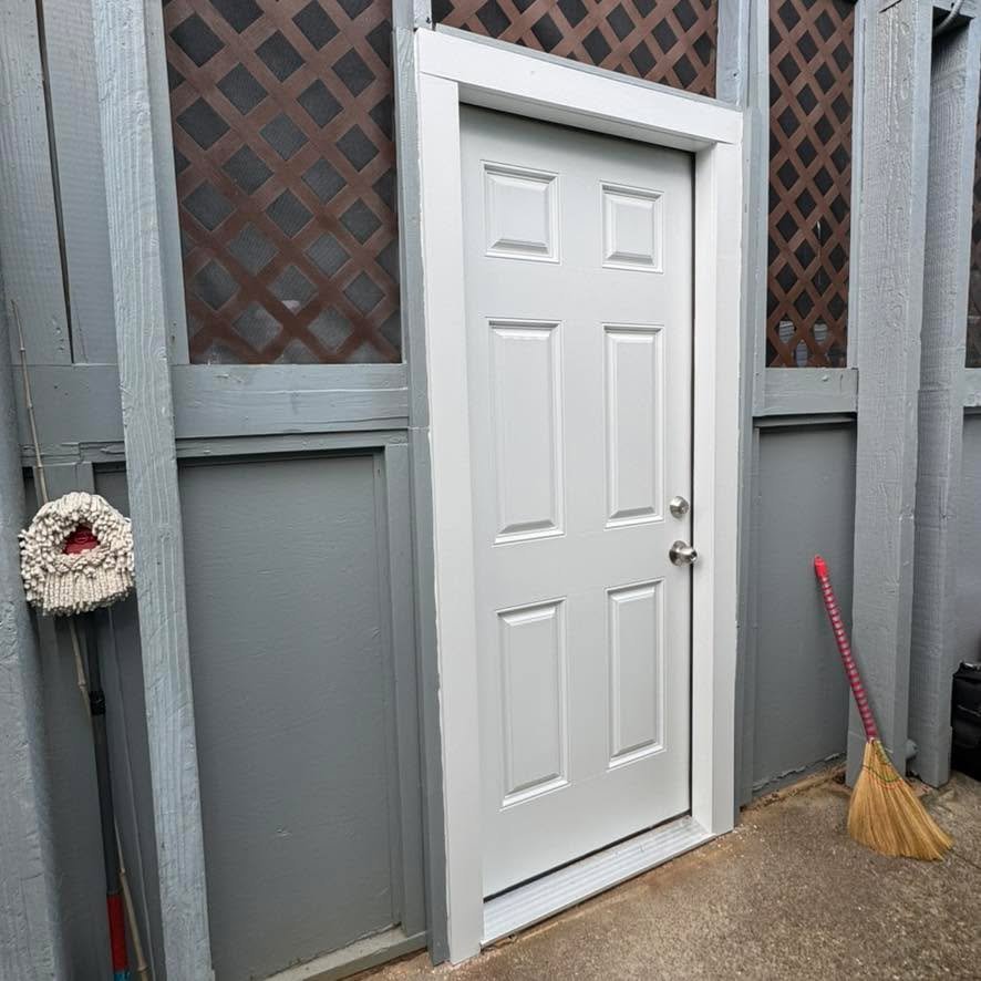 Replaced this rusted door with a fiberglass door that will withstand the elements for years to come