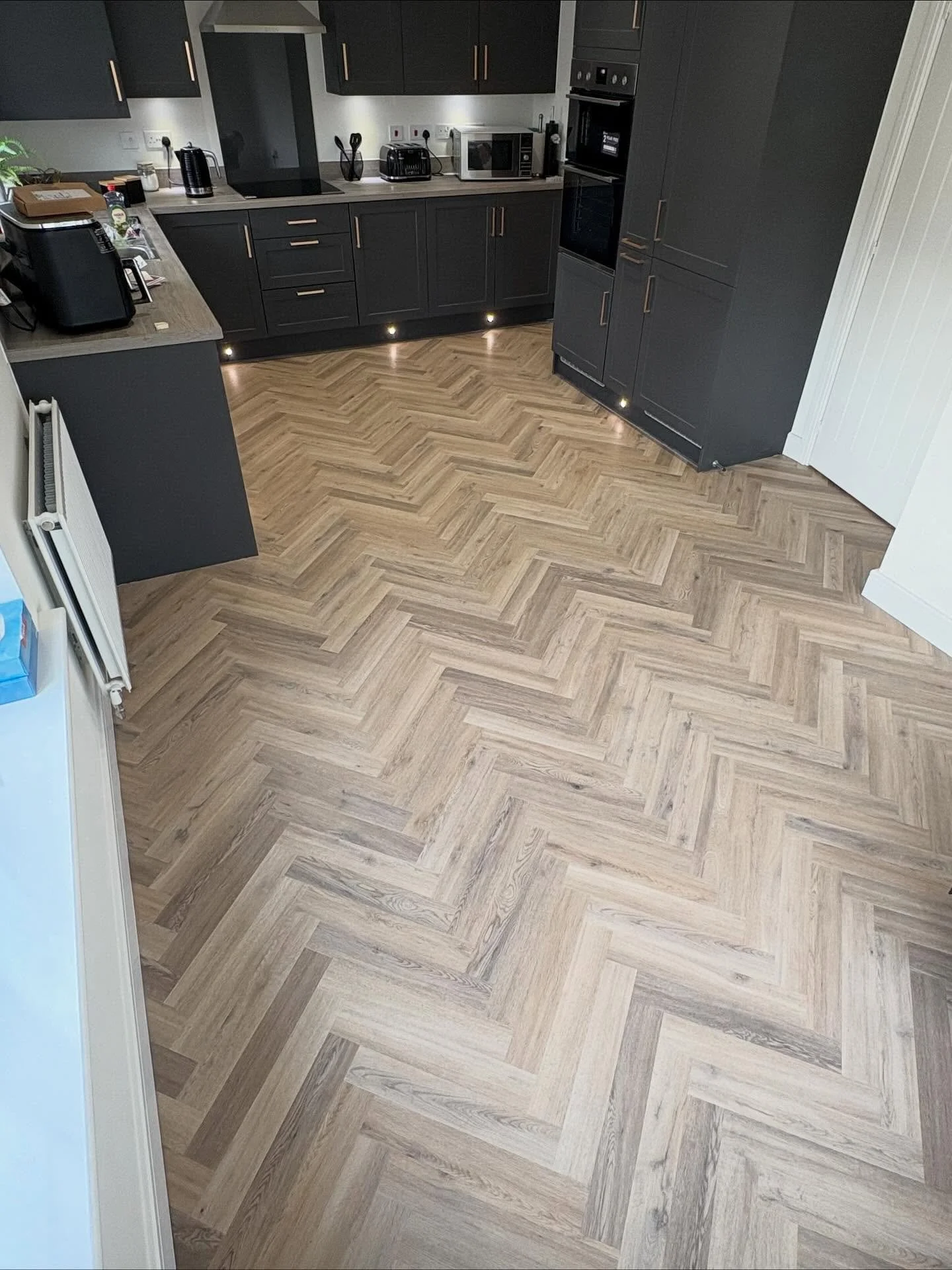 Luxury in every step, this LVT (Gluedown) herringbone creates a flawless, modern look. Every corner covered : Kitchen, hallway, utility &amp; toilet!🏠. Get in touch to enhance your space. Call/message 07552023635 or use any contact options on our pa