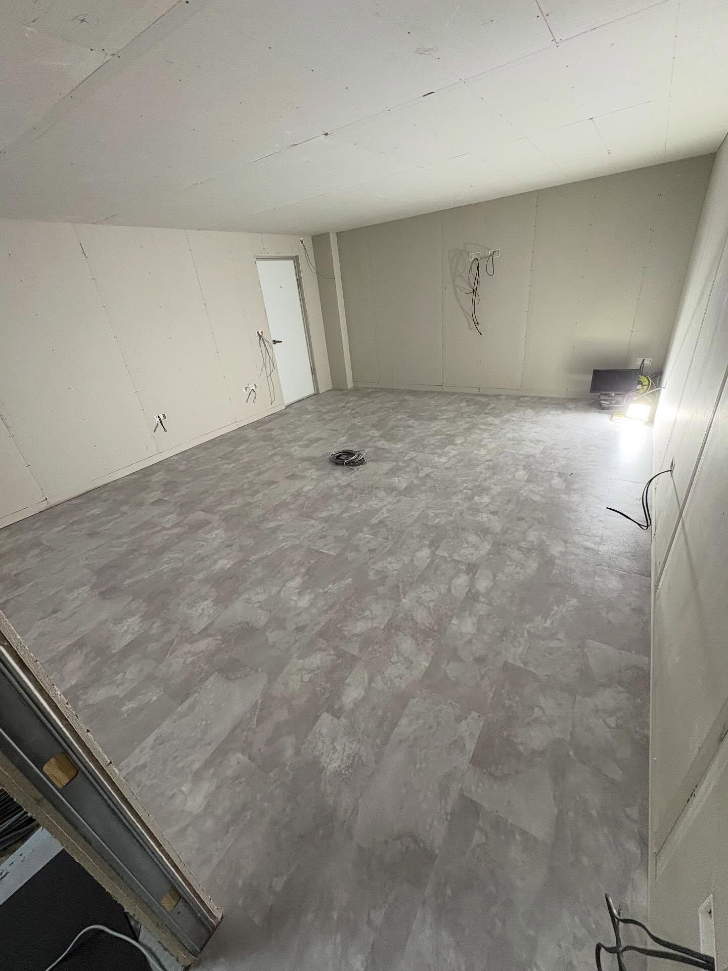 Thinking about upgrading your office flooring? Get in touch -  Gluedown LVT tiles installed, protected, and ready for this office to be completed for a regular client.