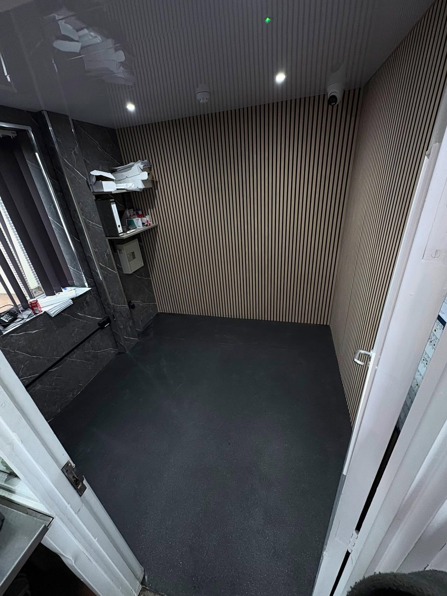 A smart flooring solution for high-traffic areas, Commercial black safety flooring installed throughout this warehouse canteen and office.