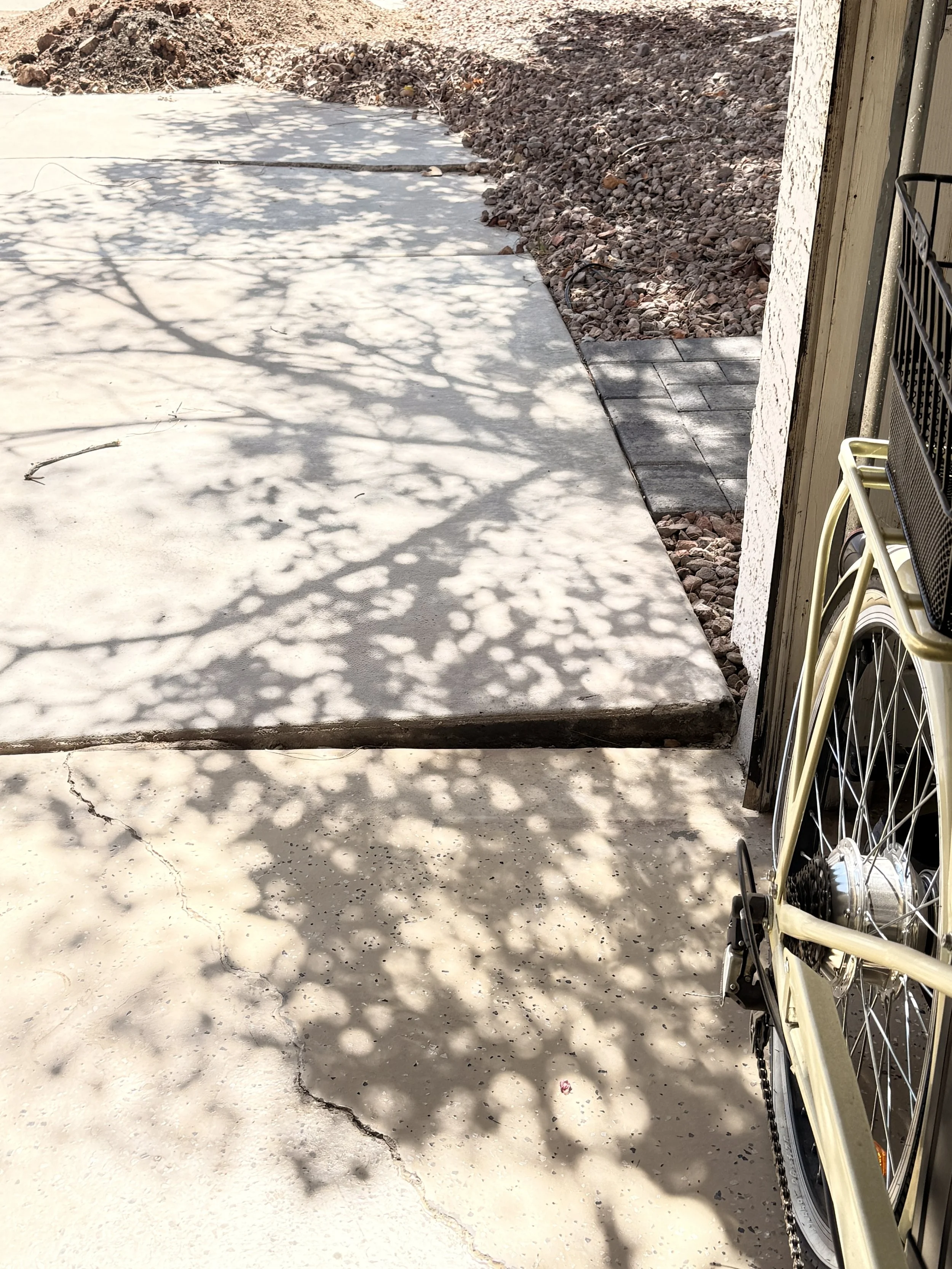 Picture of sunken concrete in an Arizona garage.  This can be unsightly and dangerous.
