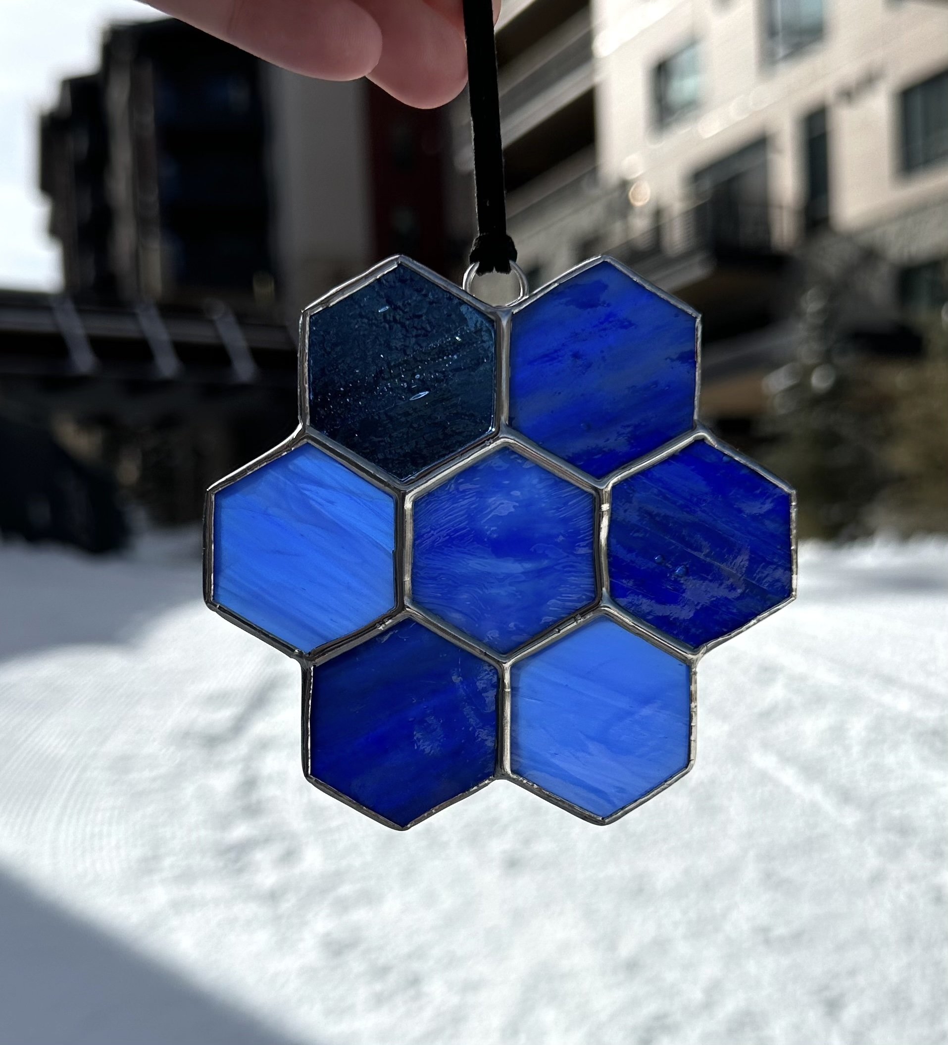 six hexagon stained class parts soldered together