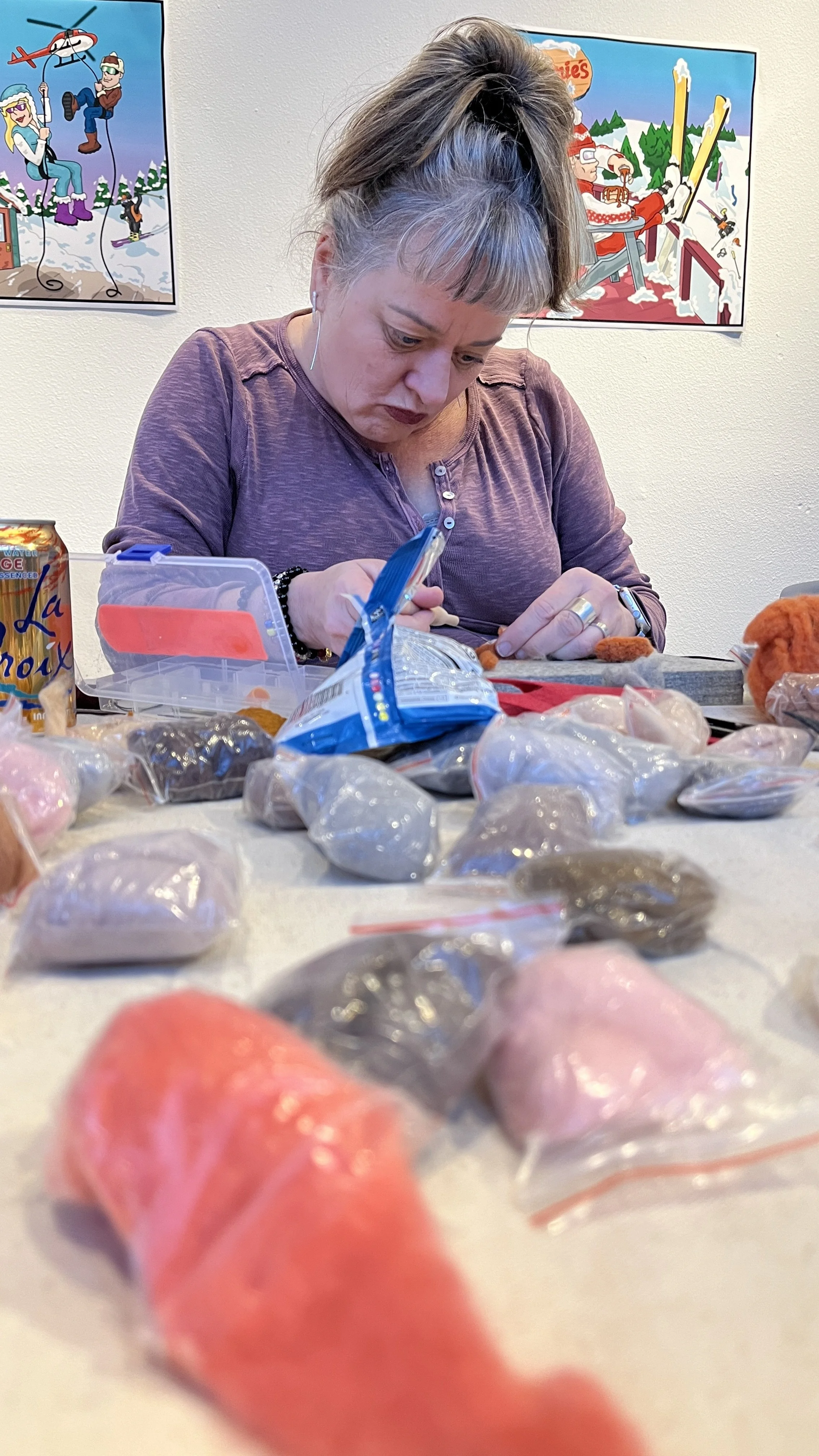 woman focused on felting