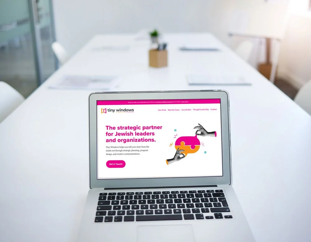 Tiny Windows Consulting website on laptop