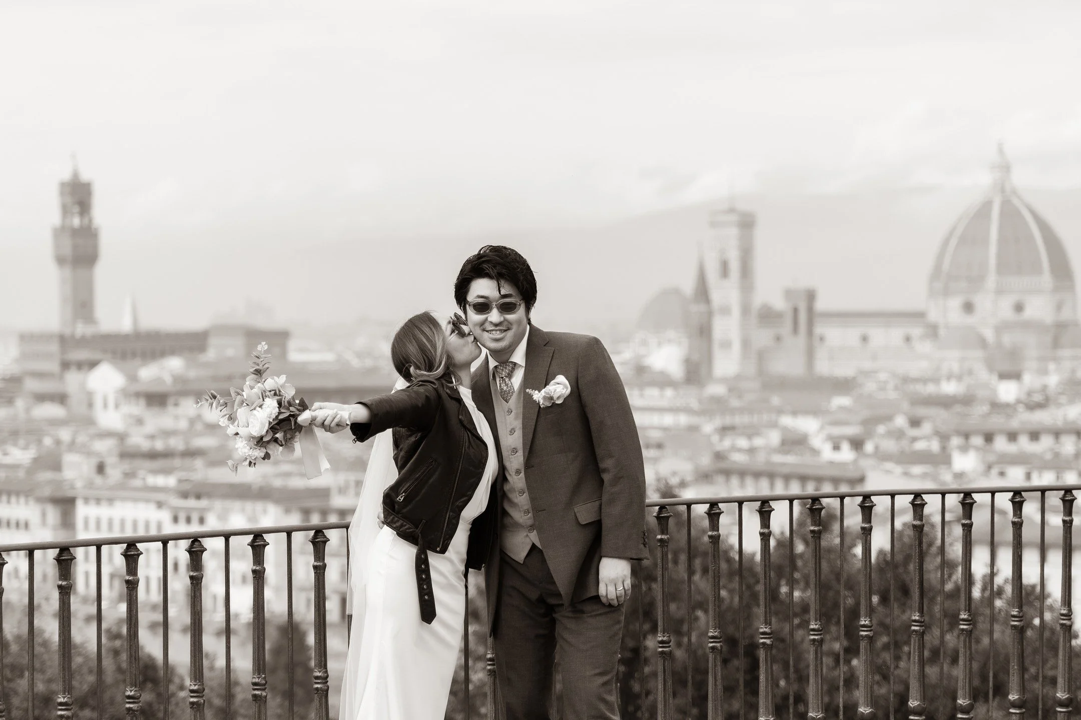 This Japanese couple is absolutely delightful, and they chose Florence as the perfect backdrop for their wedding! The photos beautifully capture their joy and unique style, with a mix of elegance and modern touches—especially the bride's leathe