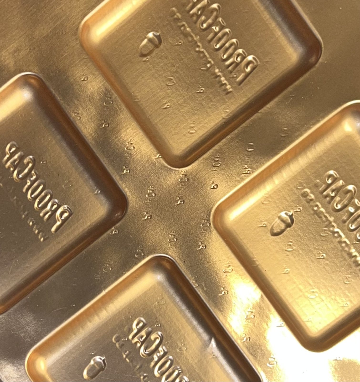 PROOFCAP laminate is manufactured in flat shape of metal foil and thermoplastic films and drawn into a bowl shape