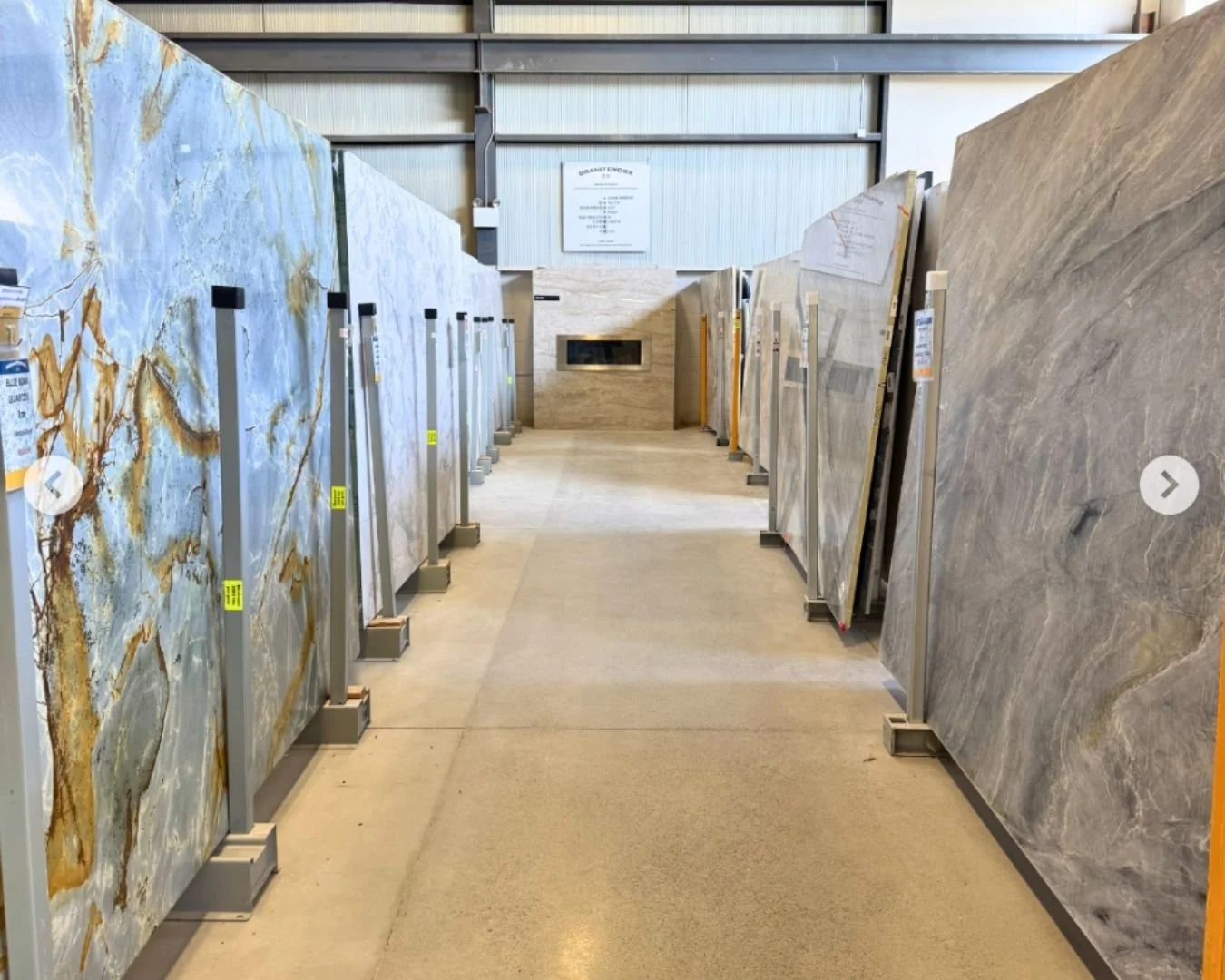 Granite and quartzite slabs on display in the GraniteWorx countertop showroom in Guelph, Ontario.