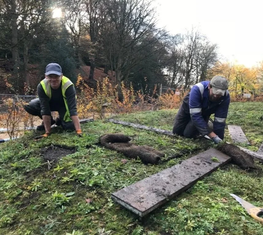 Sally Marshall Garden Design and Wildflower Turf Ltd hard at work laying down wildflower turf outside of Devour restaurant in holmfirth. Laying the groundwork for long-lasting conservation improving wildflower gardens