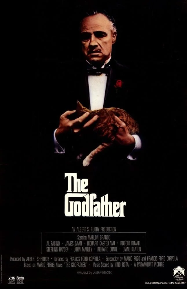 Classic The Godfather film poster, dark and iconic — a legendary film pairing for a truly indulgent wood-fired pizza night at home.
