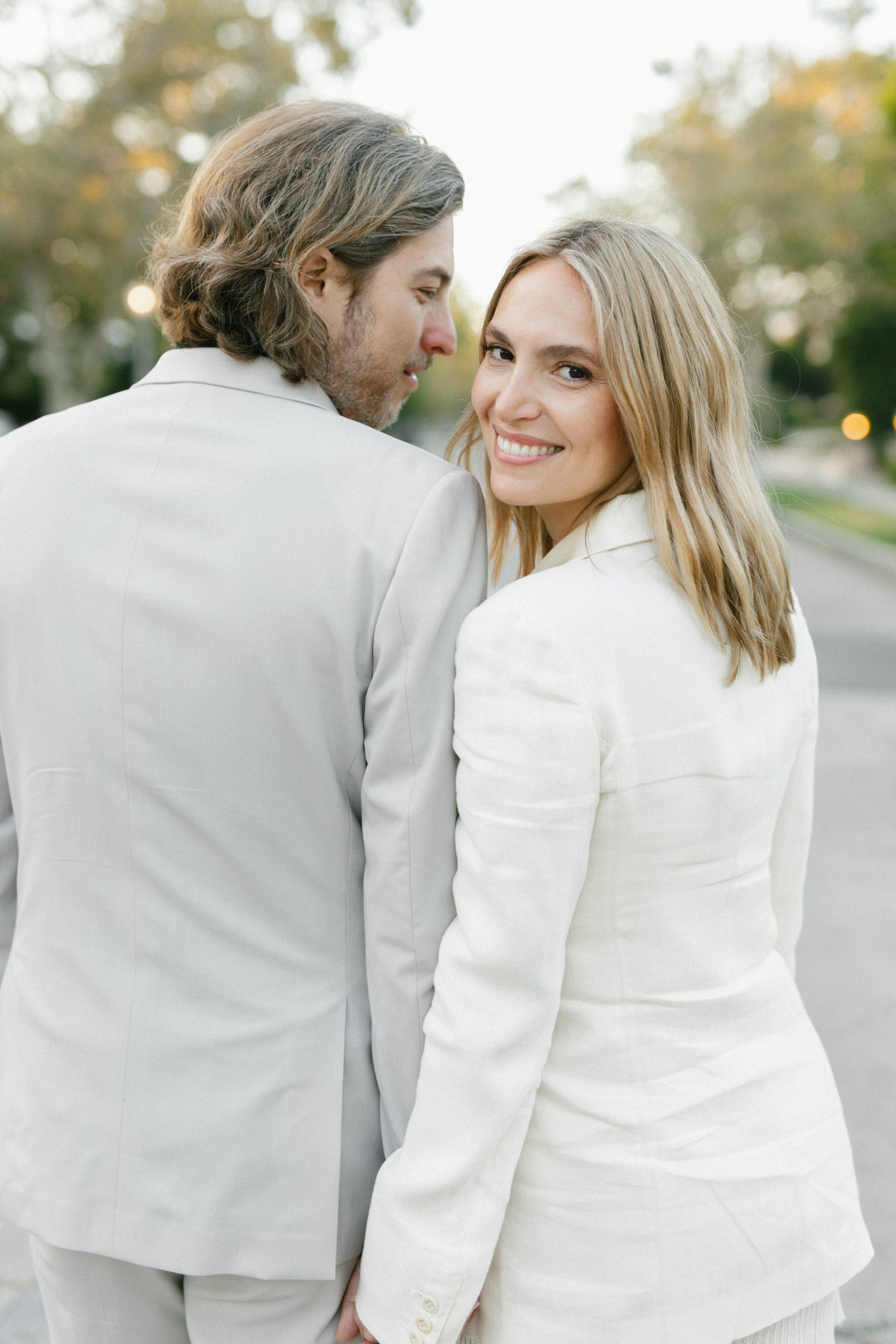 Santa Barbara wedding photographer katie edwards captured stylish LA couple walking around their neighborhood for engagement photos