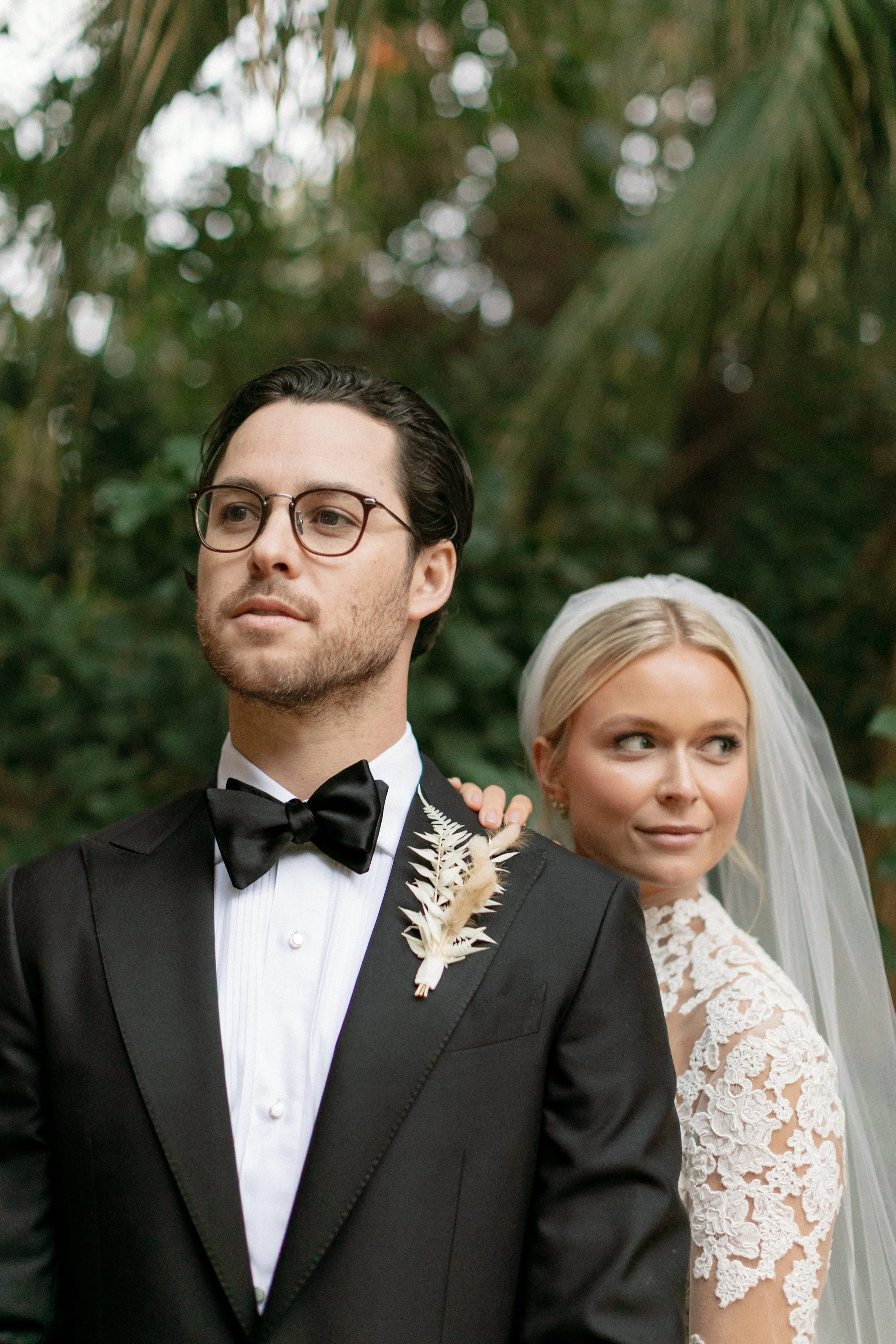 Kate Alvarado wedding in Palm Desert captured by high end wedding photographer Katie Edwards. The couple is looking away, looking very handsome and stylish. Classic photography by Ojai wedding photographer Katie Edwards.