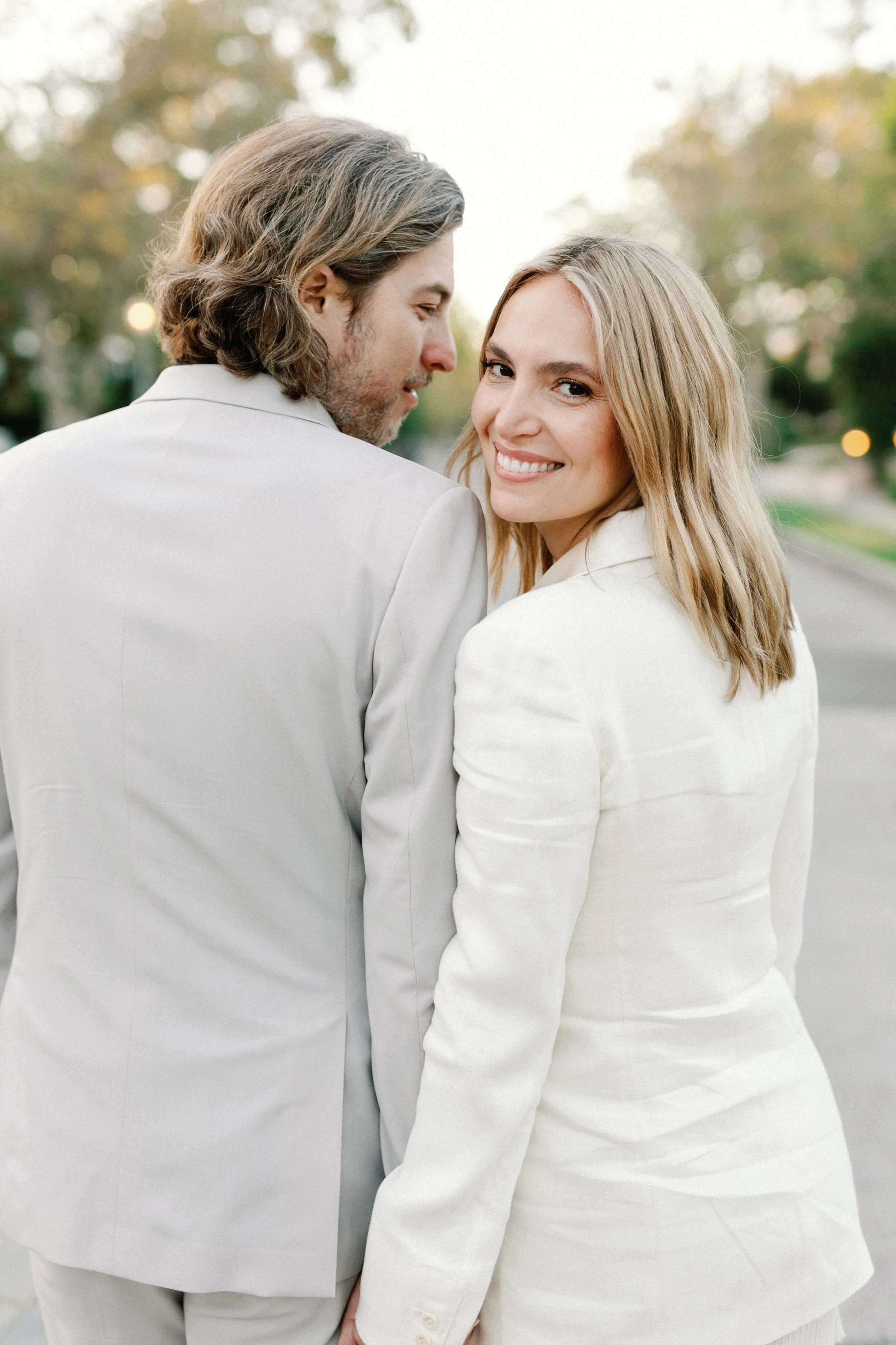 Gorgeous LA couple strolling in their neighborhood. Photo taken by unique and creative photographer based in Ojai, Katie Edwards.