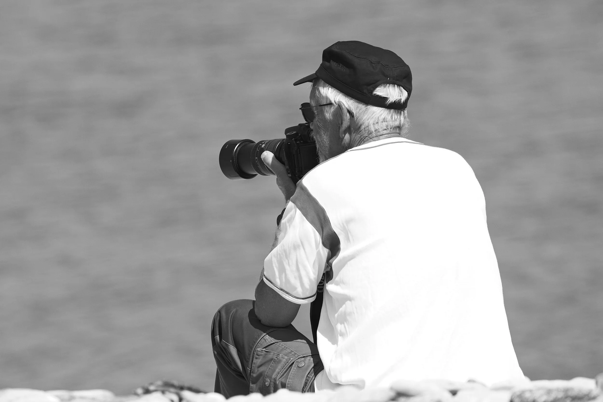 Photographer in creative photography workshop on Stora Karlsö-island in Sweden