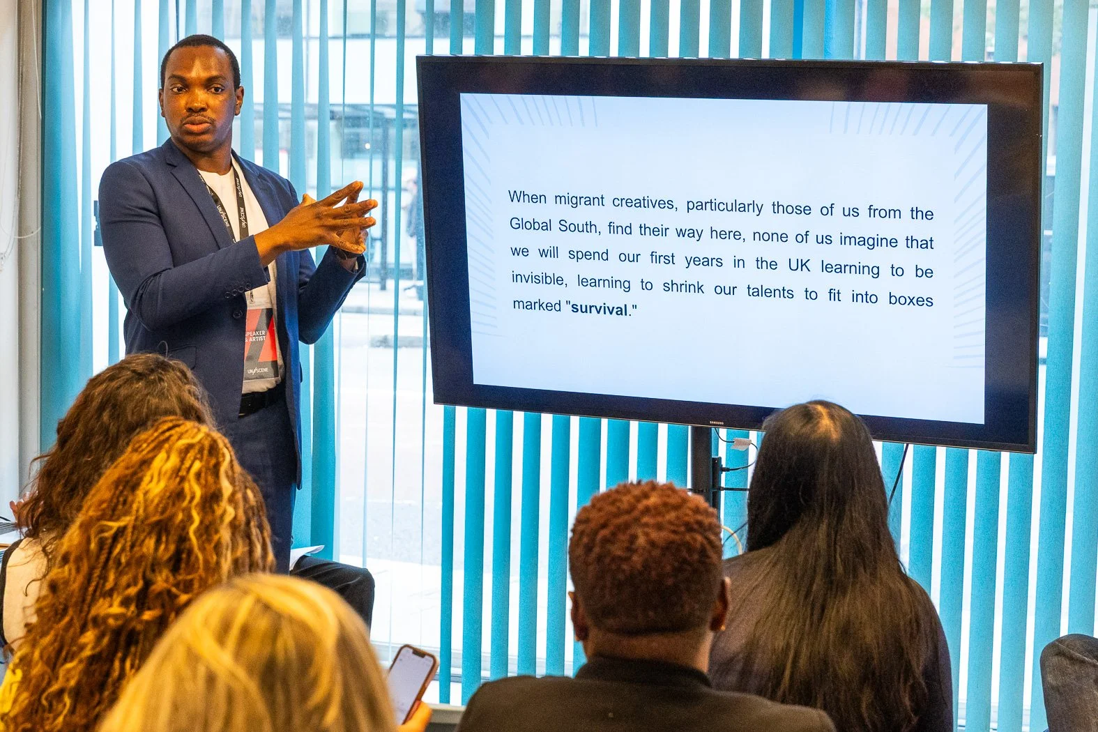 Jerry Chimieke gives his talk on migration and creativity.