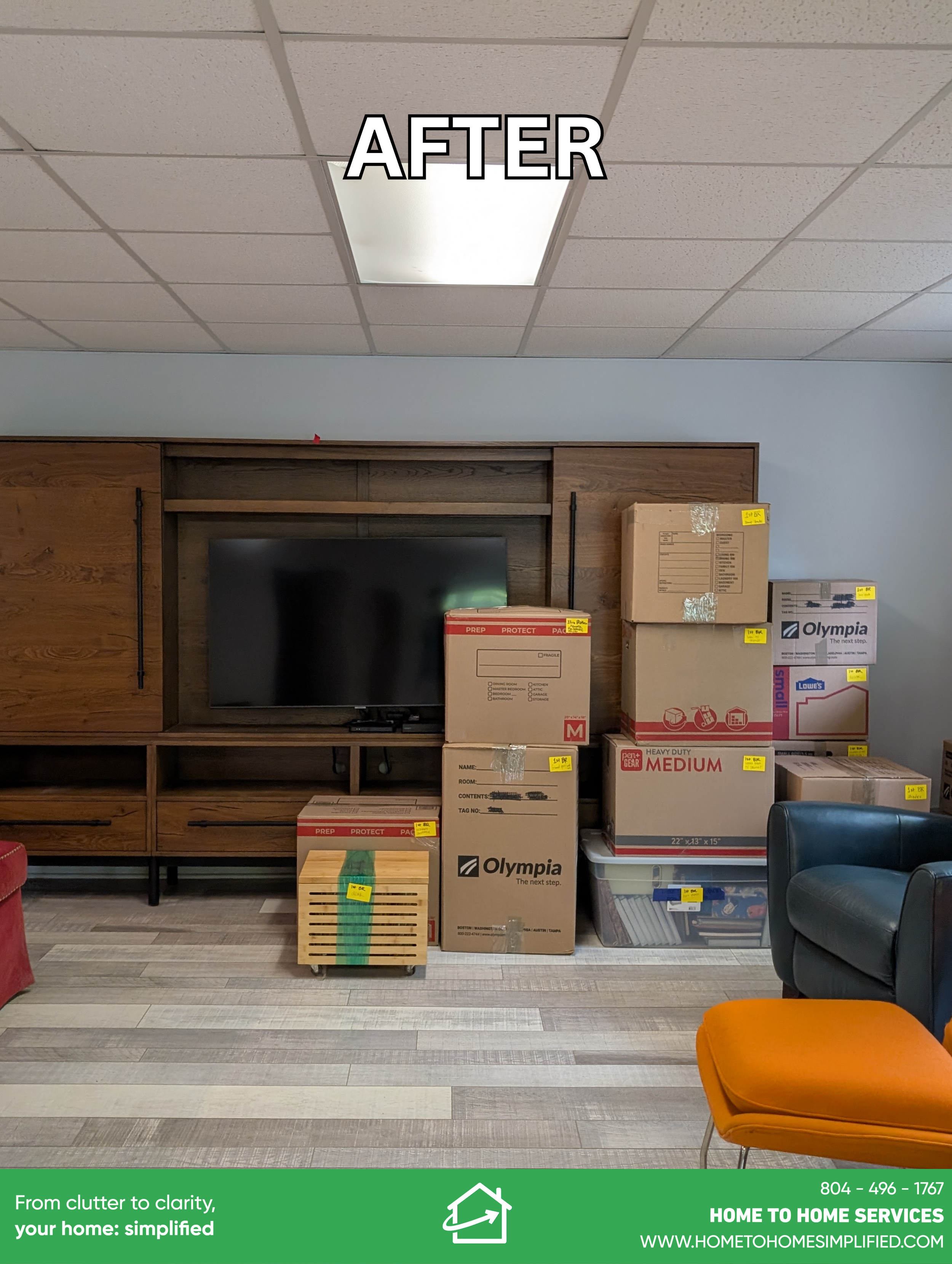 Every item from the entertainment unit and living room — the baskets, the collectibles, the books, the memories — now safely packed and stacked in clearly labeled moving boxes along the wall. The furniture is staged and the floor is clear. What was o
