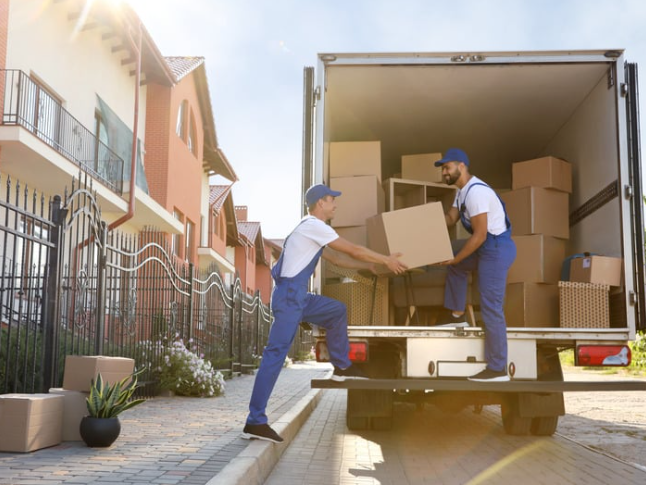 Neatly stacked labeled moving boxes ready for a stress-free move, packed by Home to Home Services in Richmond, VA