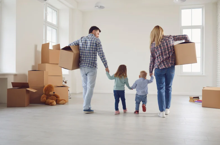 A happy family moving into a new home with Home to Home Services in Richmond, VA