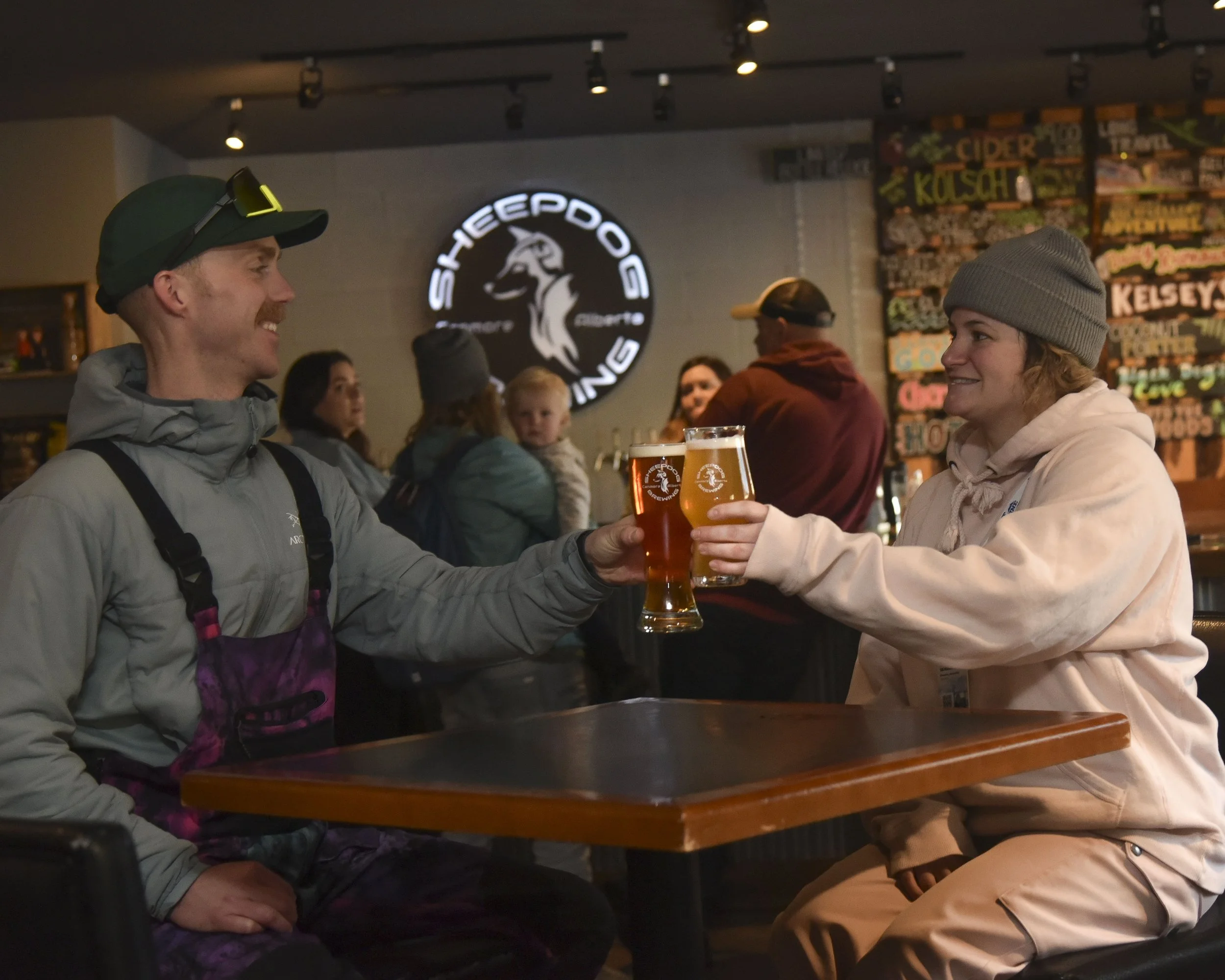 Restaurant with wine barrels and mountain views