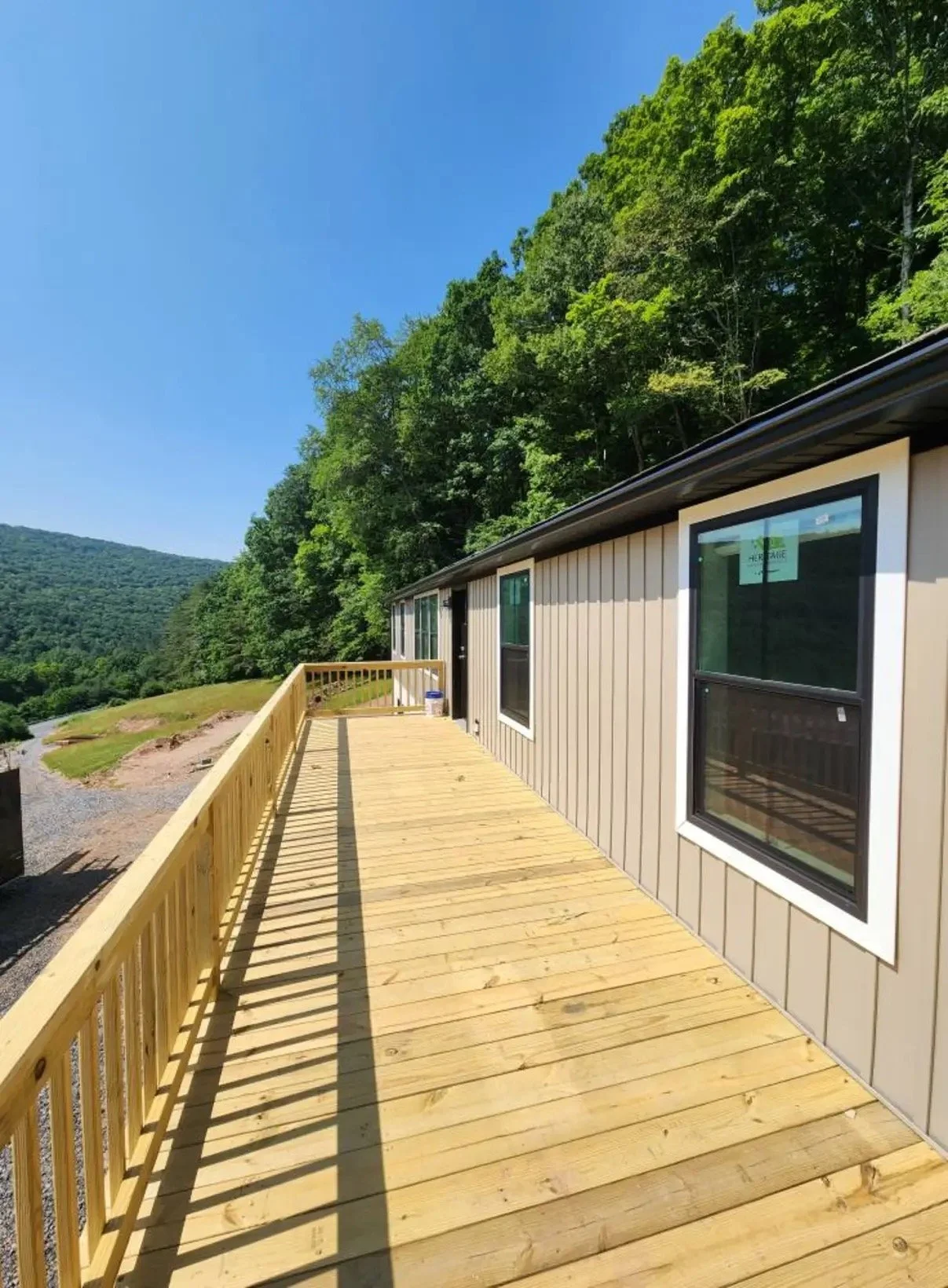 Newly constructed wooden deck, gutter.