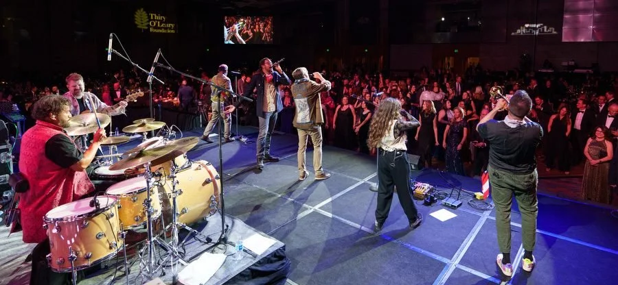 band performs to a dancing crowd