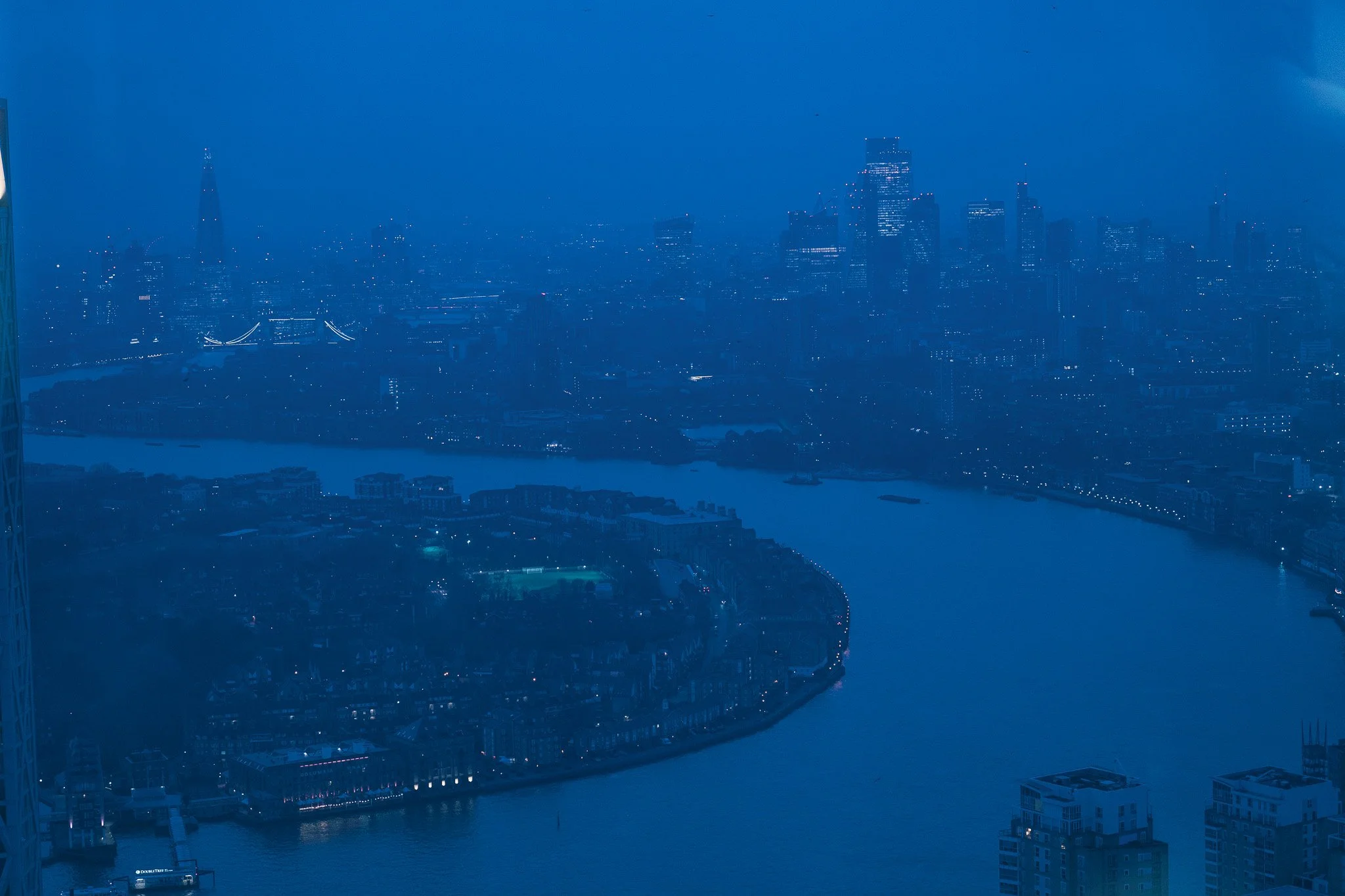 A gradient background blending purple, pink, and blue colors.