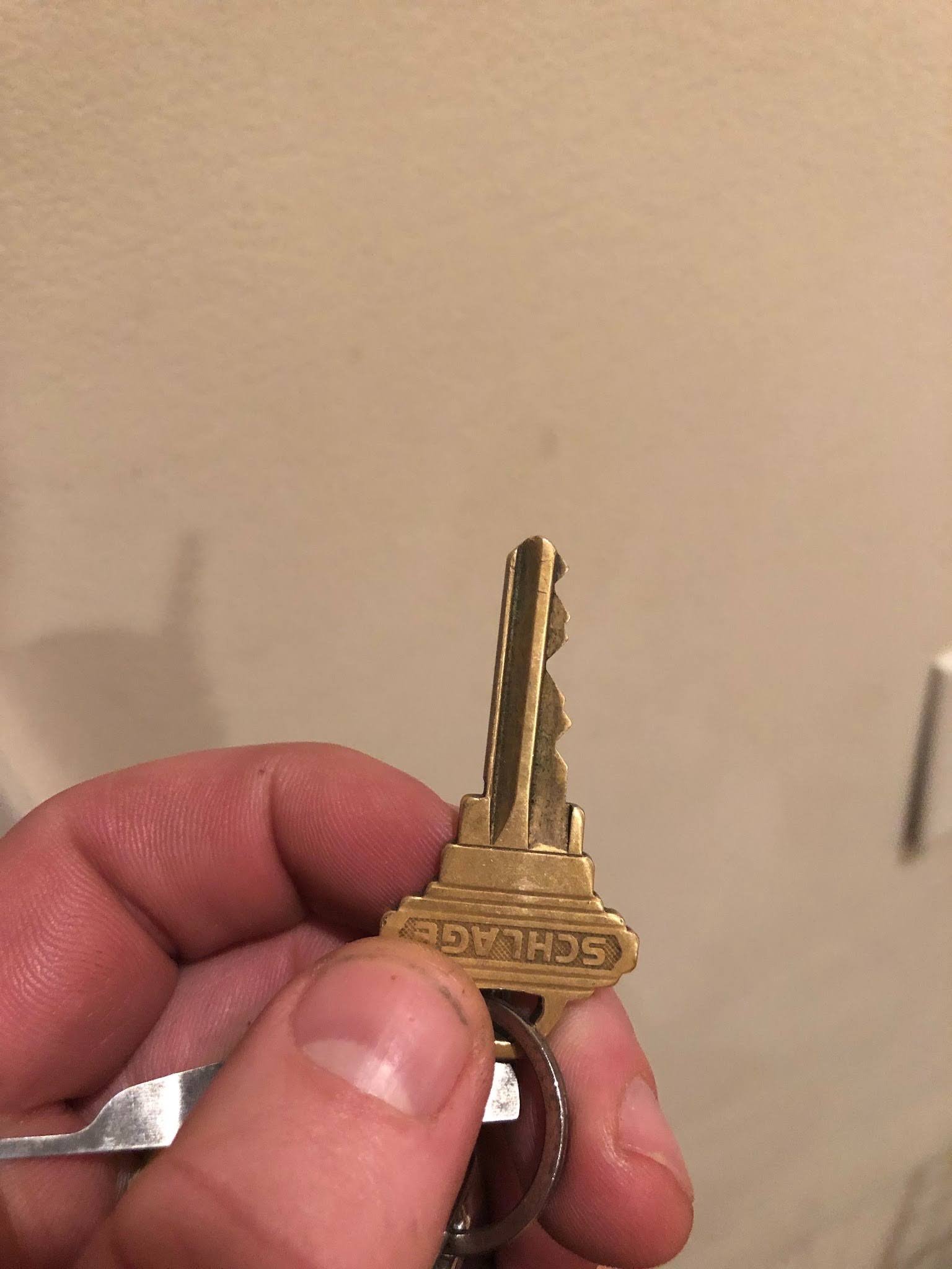 Real GBP photo showing a smart lock, keypad lock or electronic lock being installed.