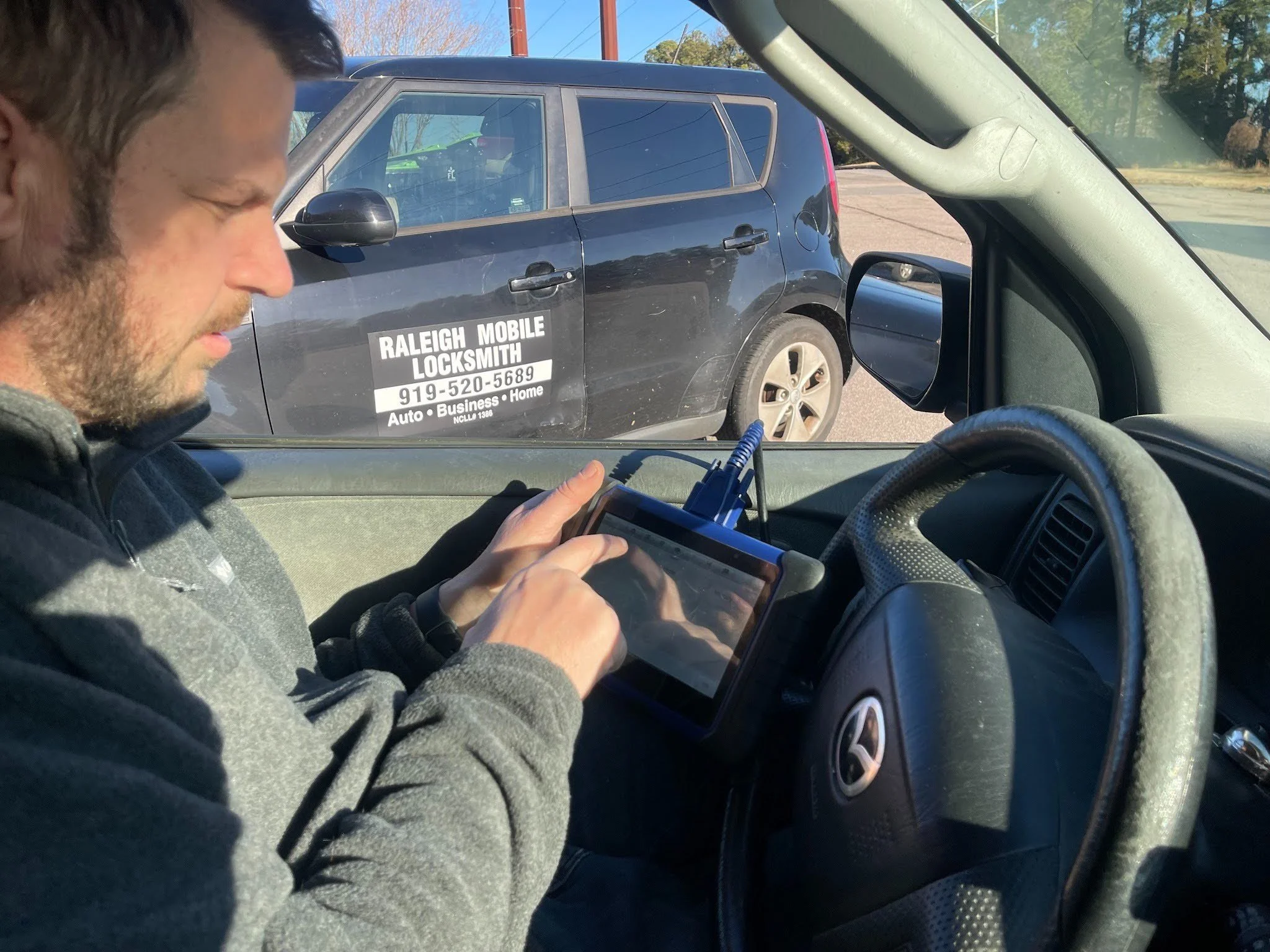 Real GBP photo showing an active service call at a vehicle, home or business. Choose something that shows the mobile nature of the business.