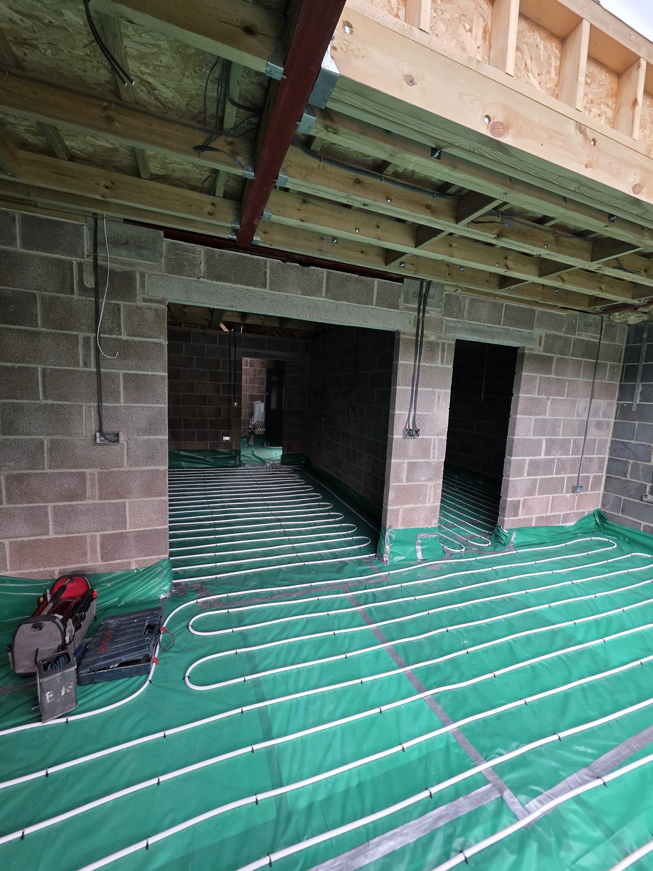 Underfloor heating installation at bungalow in Highcliffe