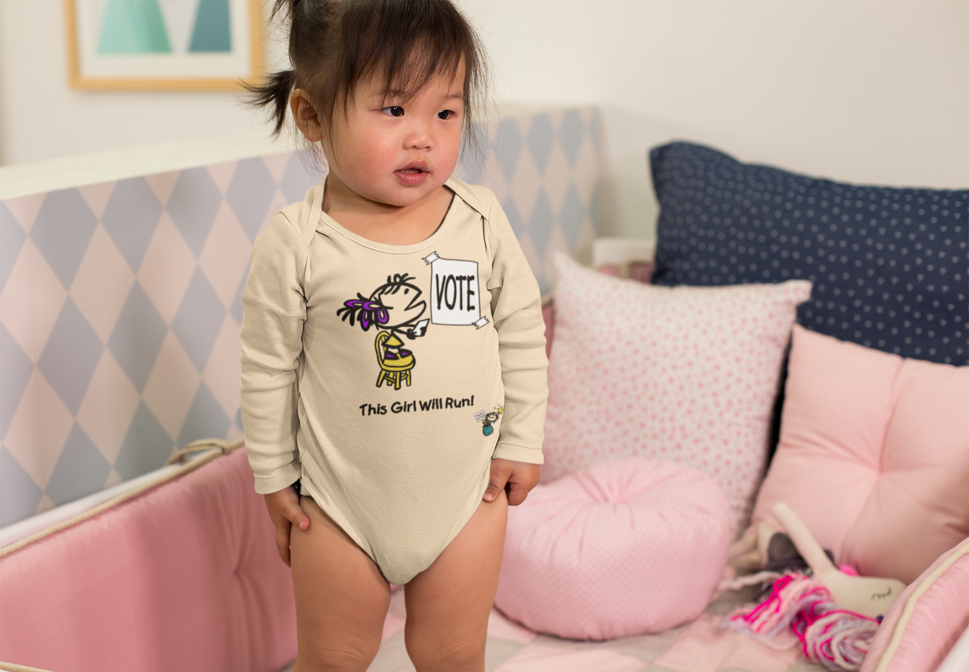mockup-of-an-adorable-baby-girl-wearing-a-onesie-in-her-crib-25135.png