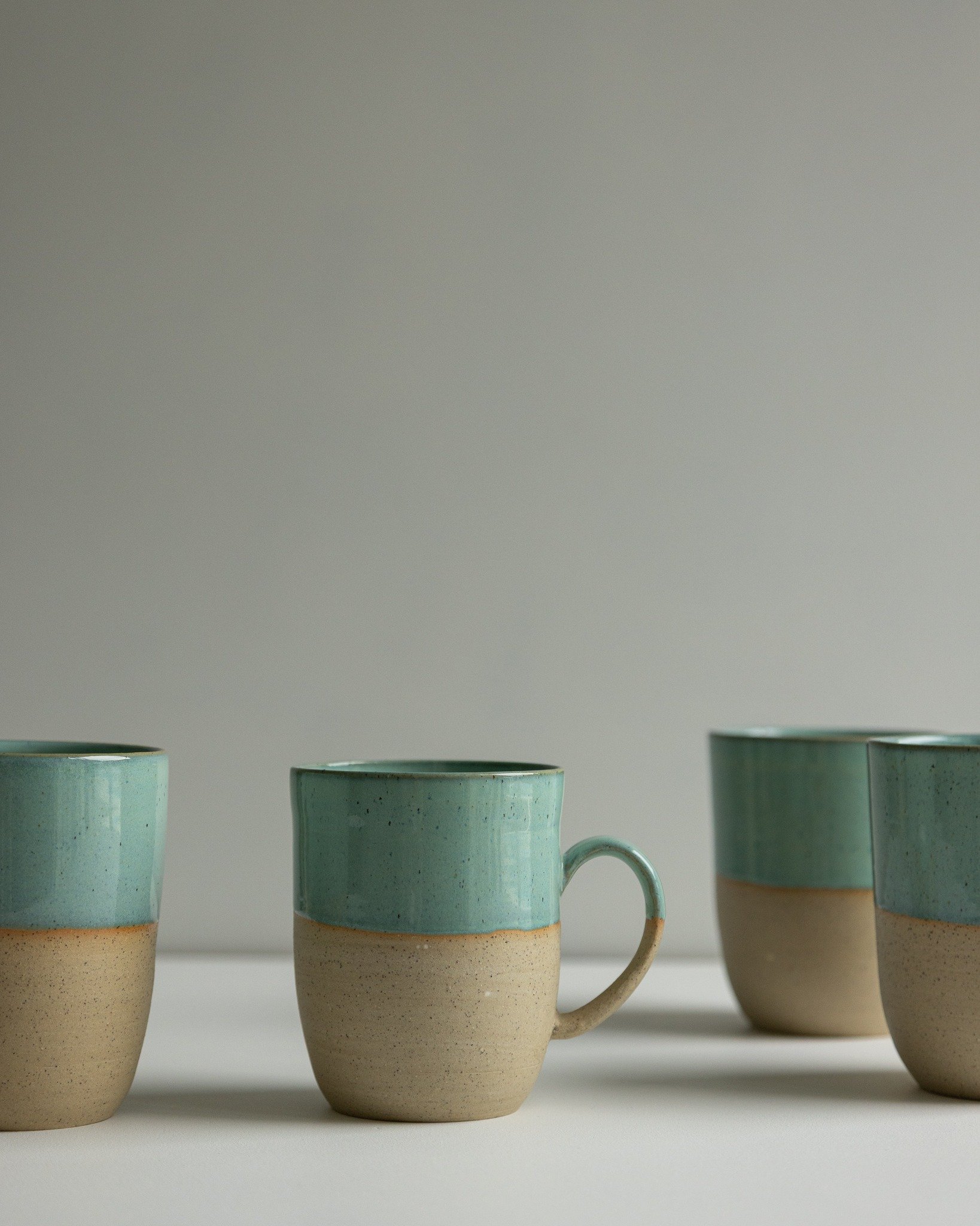A small batch of mugs, finished last week.
Everyday pieces, made with care for the ocean.