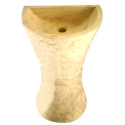 Stone sink with a curved, hourglass shape and a smooth, rounded basin.