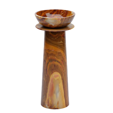 Marble-colored pedestal with a bowl on top