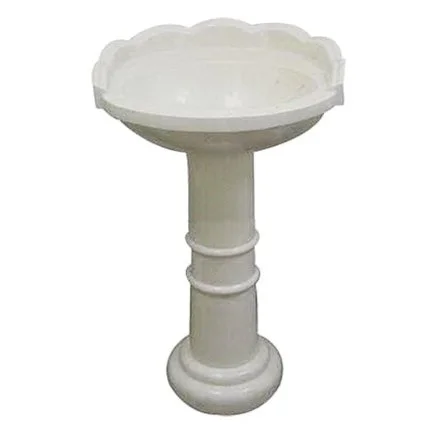 White birdbath with scalloped edge and cylindrical pedestal base