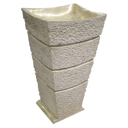 A tall, textured, cream-colored decorative outdoor planter with multiple horizontal bands.