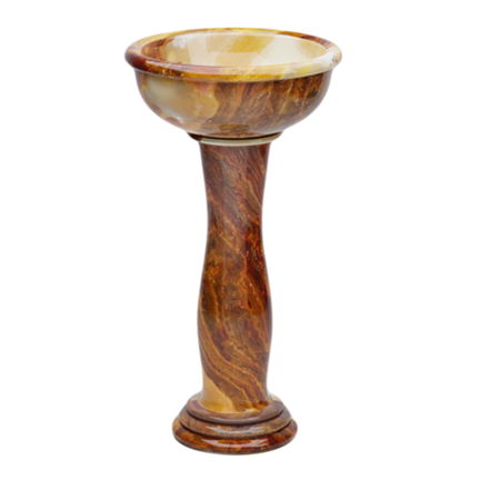 Marble or marble-like decorative pedestal with a shallow bowl on top.