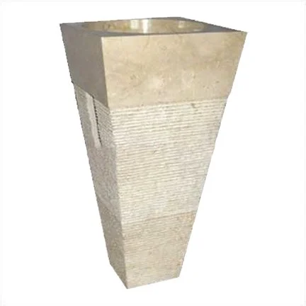 A tall, rectangular stone planter with a textured base and a smooth, beige top.