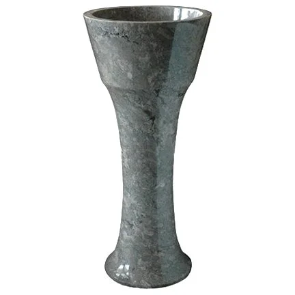 A gray stone or concrete vase with a flared opening and a narrow base.