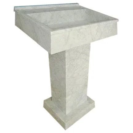 A white marble pedestal with a square top and base.